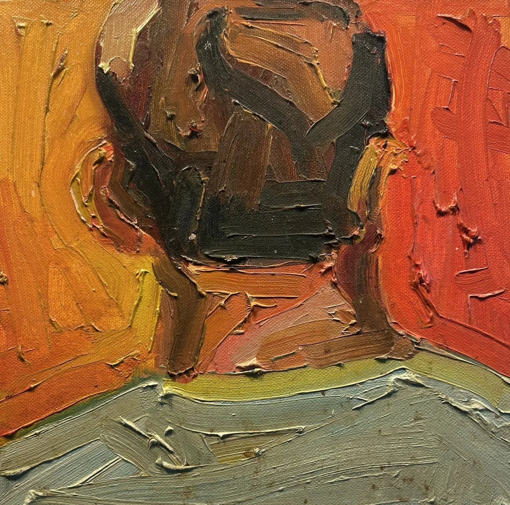 Close-up of an abstract oil painting with bold, textured strokes in shades of orange, red, black, yellow, and gray.