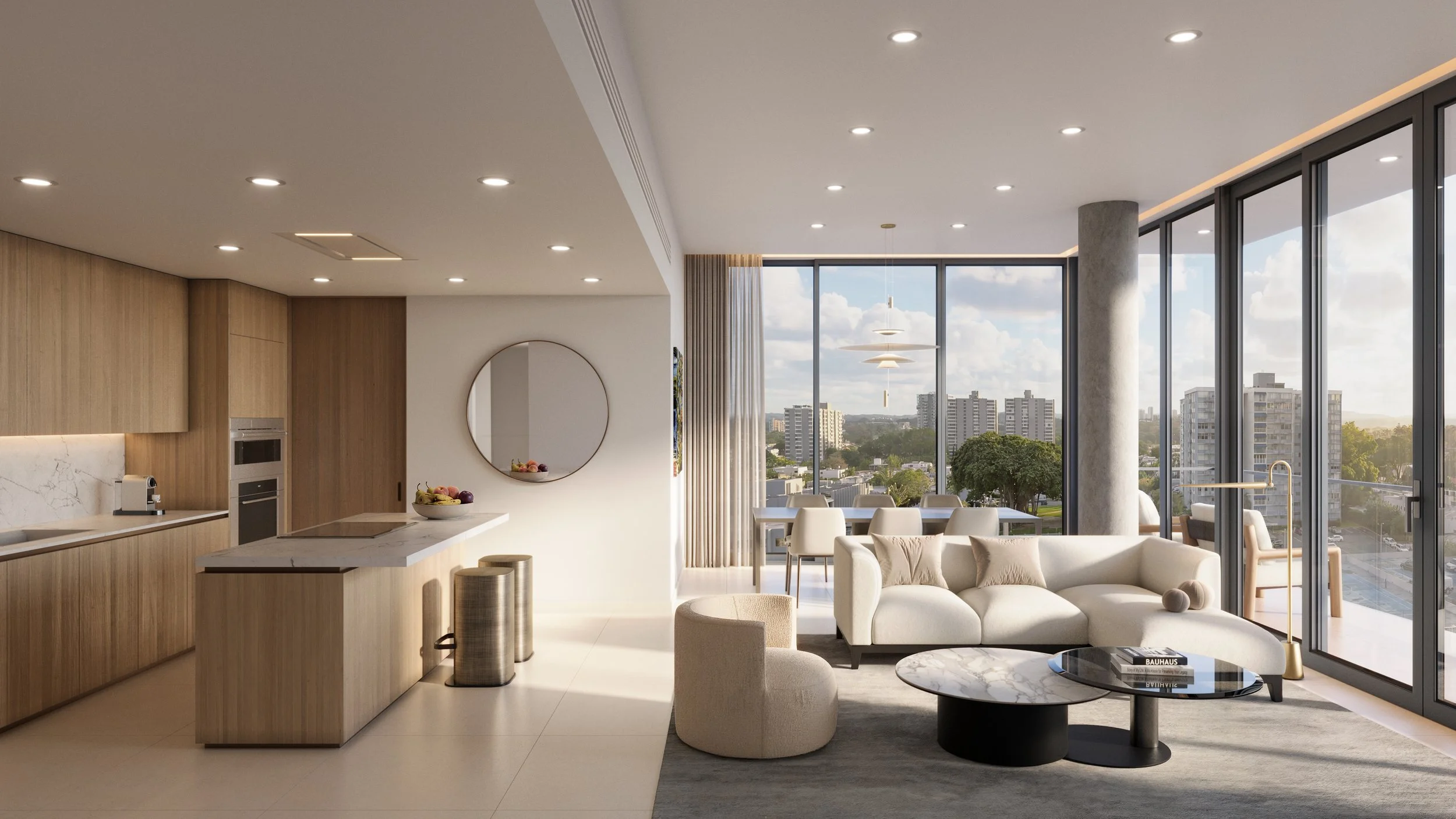Modern open-concept living room and kitchen with large windows showing city view, minimalist furniture, and natural light.