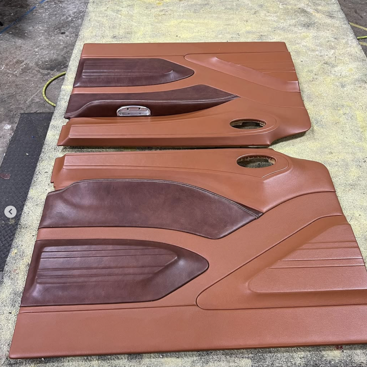 Two custom built door panels with brown and tan colors for a vintage truck