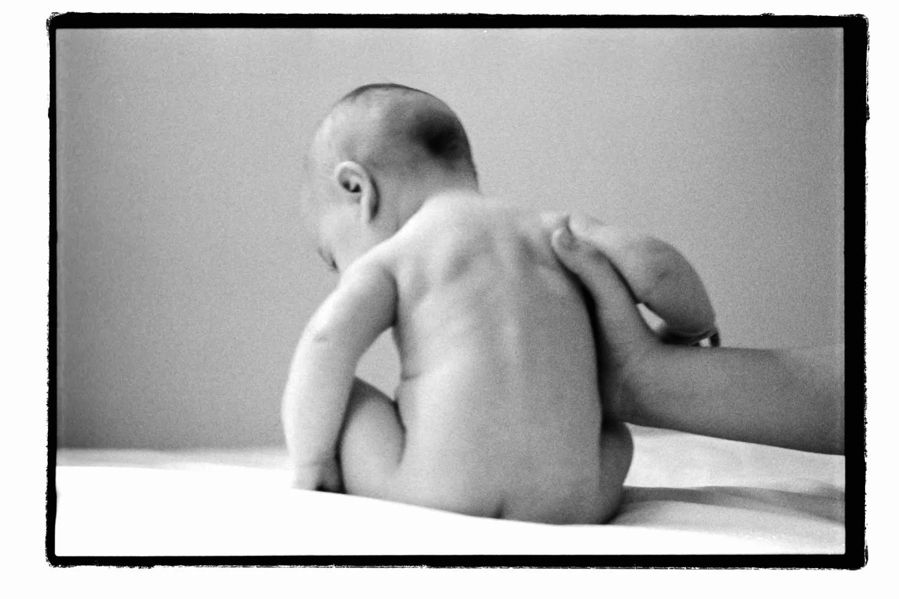 Baby, black and white photo of baby, mom and baby, postpartum doula, Patterson O'Sullivan, Marshall NC, NYC