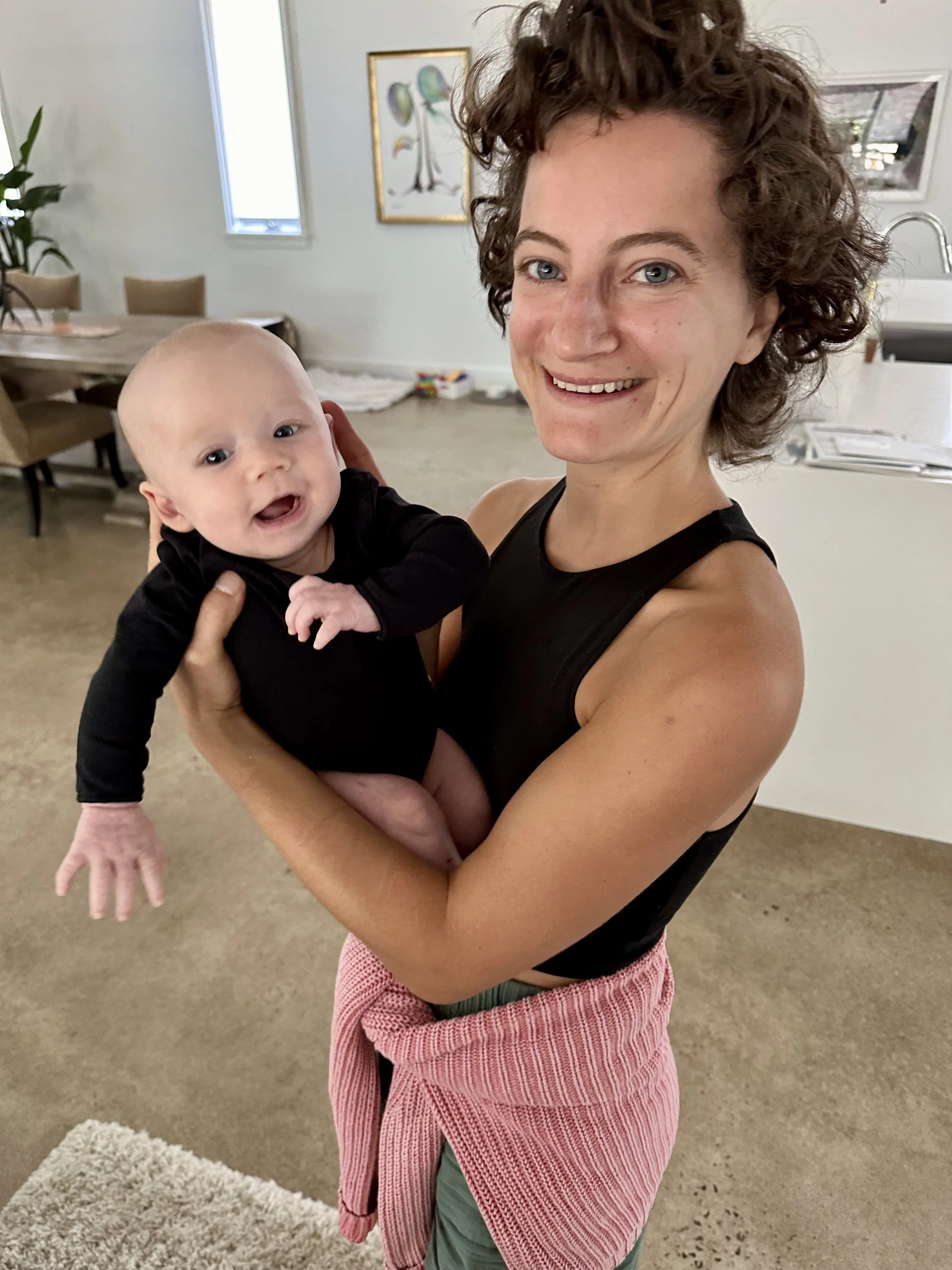 Woman and baby, Patterson O'Sullivan, postpartum doula, newborn care, neonatal care, Marshall NC, NYC