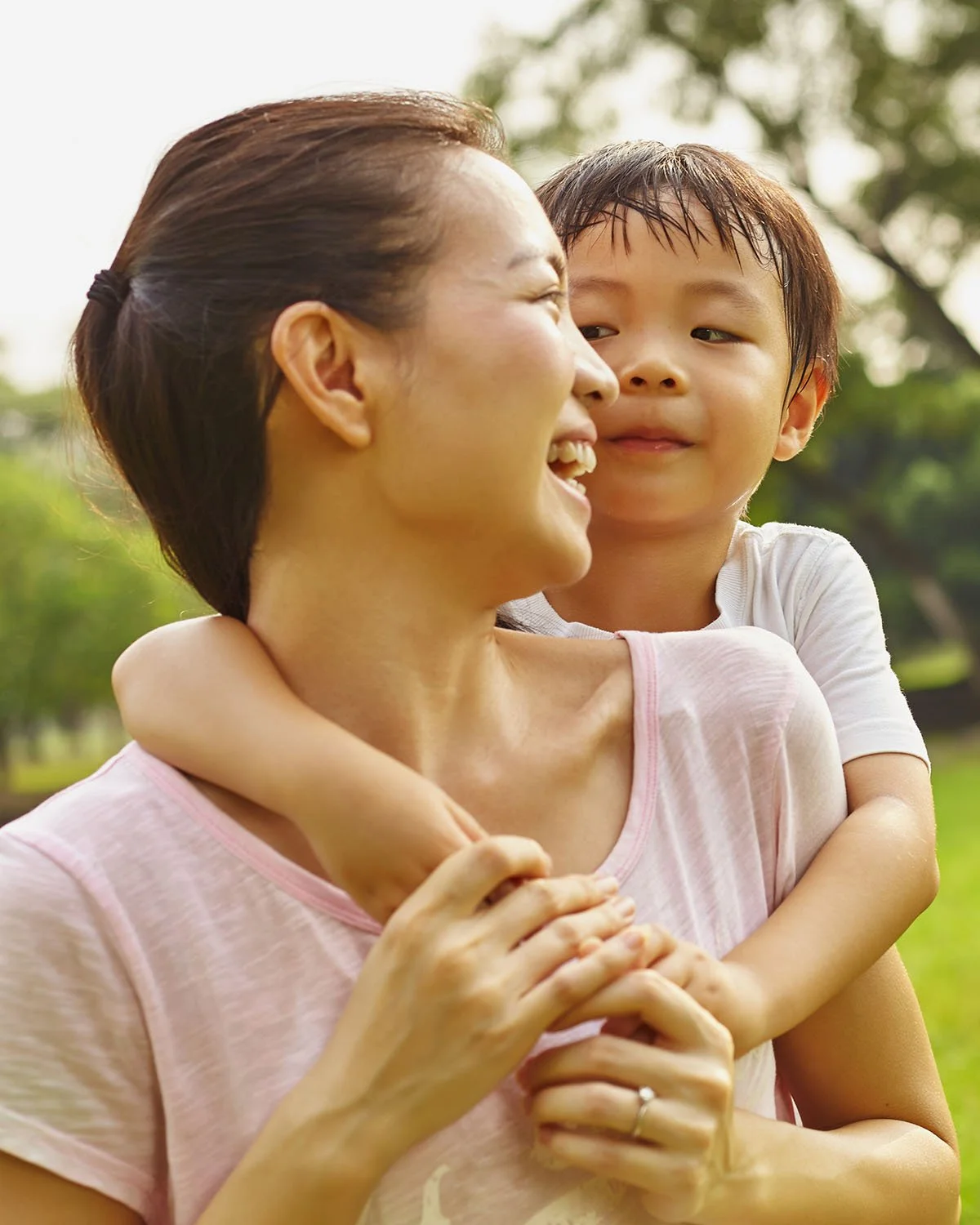 Son hugging mother