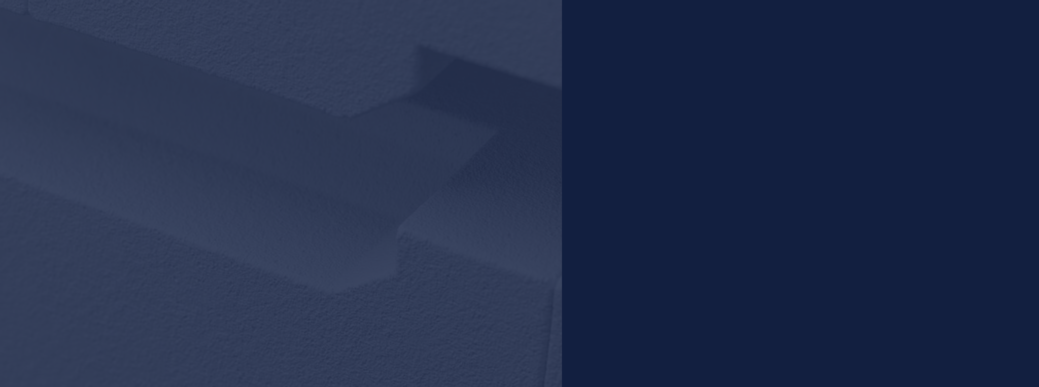 Close-up of light gray, textured architectural ceiling with indirect lighting