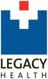 Logo for Legacy Health featuring a blue castle-like structure with a red square on top.