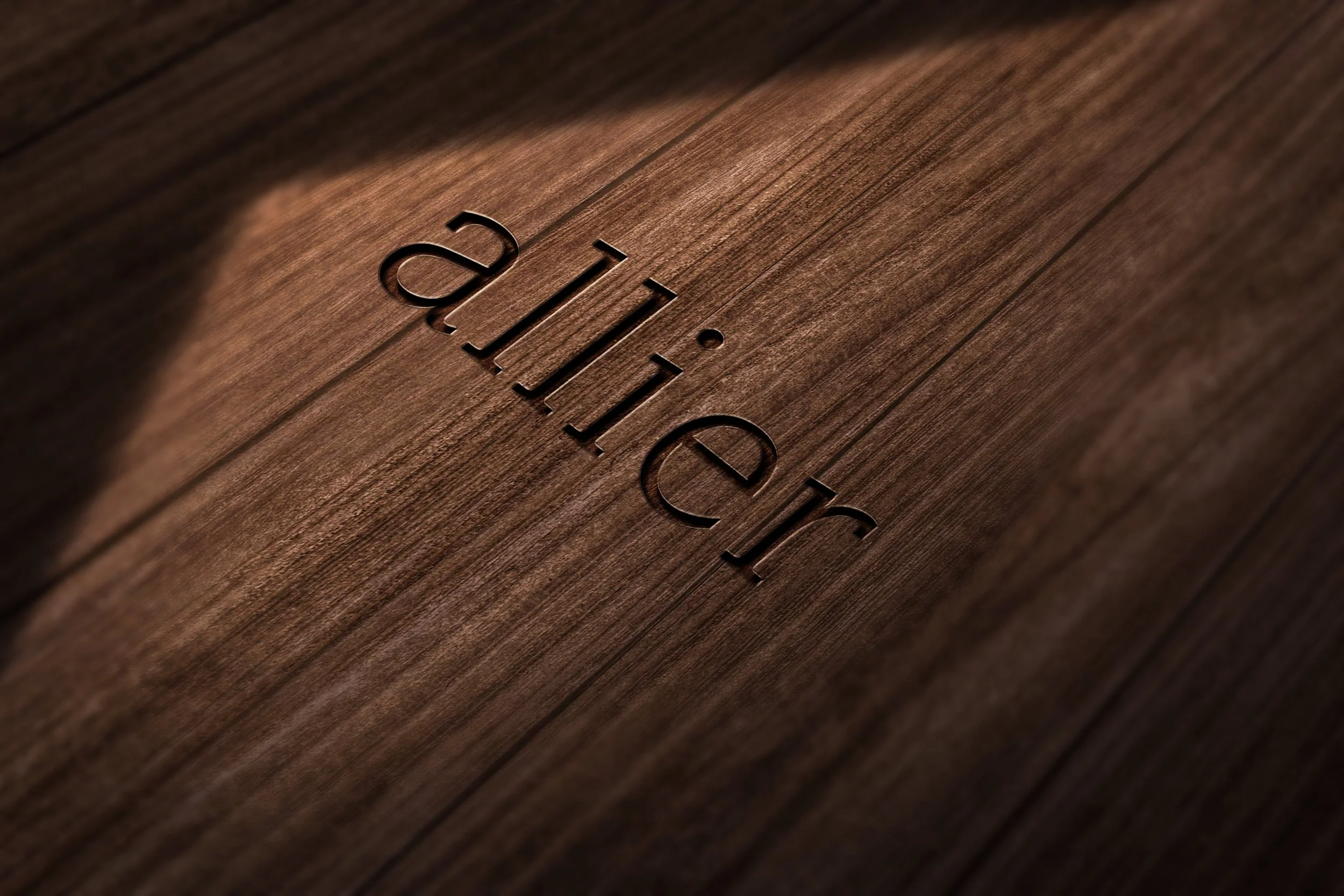 The word 'allier' embossed on wooden planks.