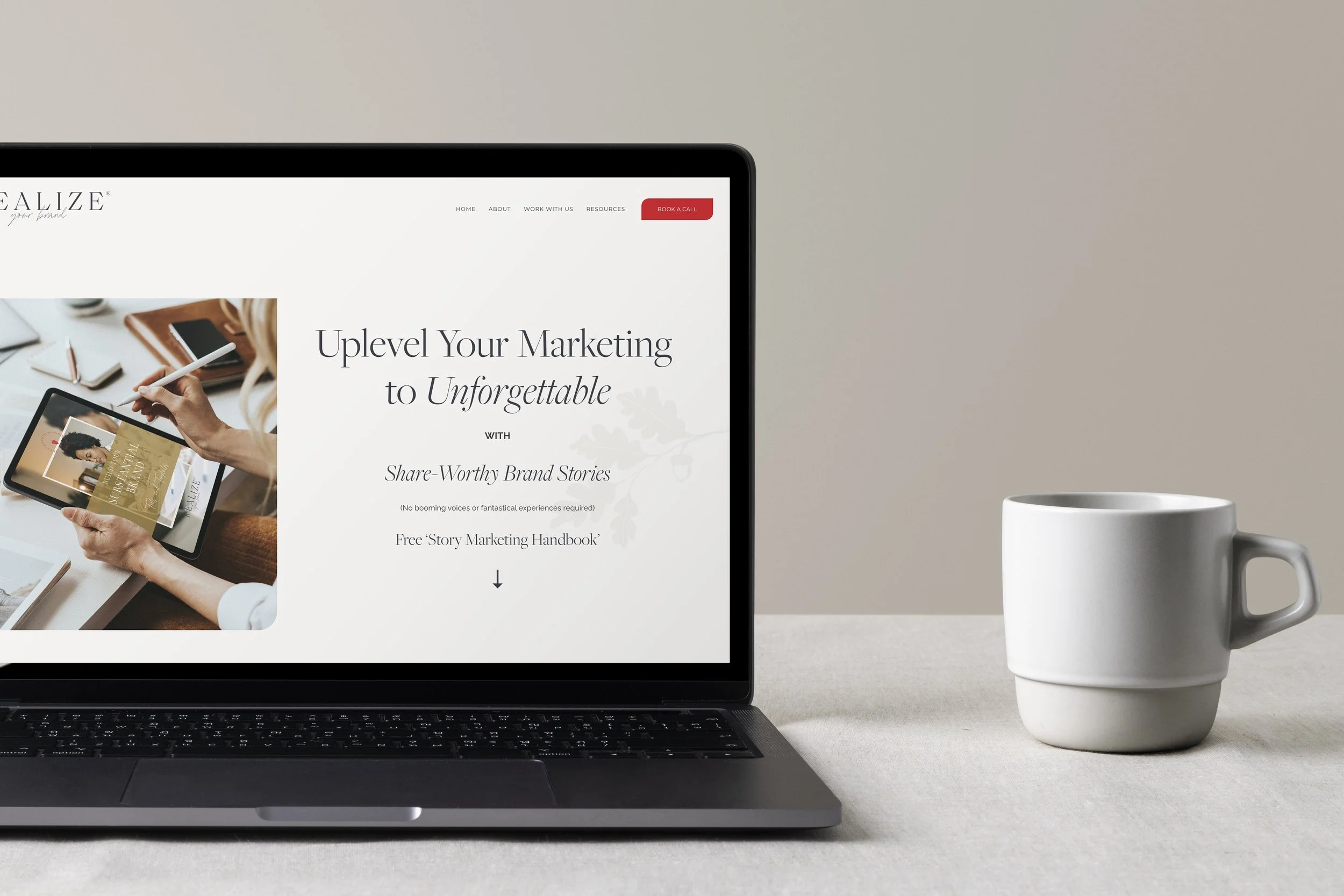 Open laptop displaying a marketing website with text about brand storytelling, and a white mug beside it on a table.