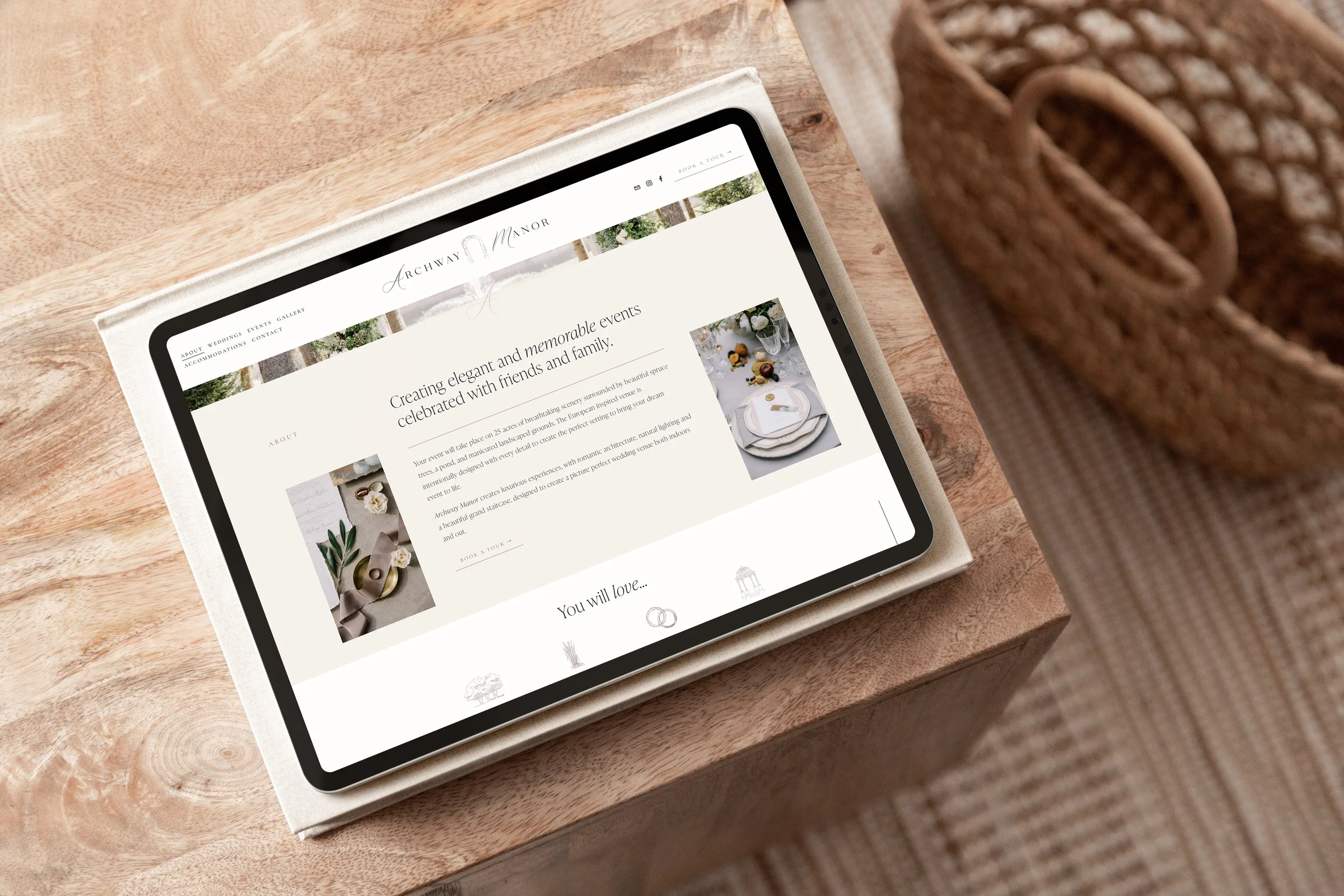 Tablet on wooden table showing a website for Archway Manor featuring event planning and table setting images.