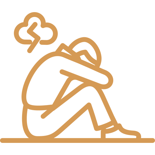Outline of a person sitting on the ground with knees drawn up and head down, holding their knees, with a thought or cloud bubble above their head indicating sadness or stress.