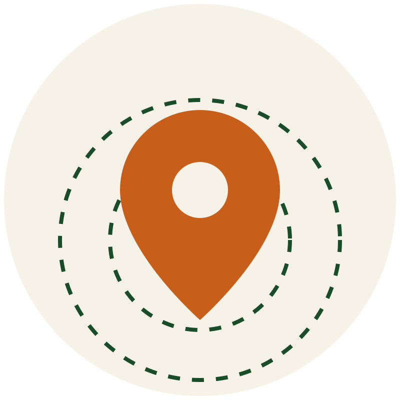 orange map pin with 2 green circles around it