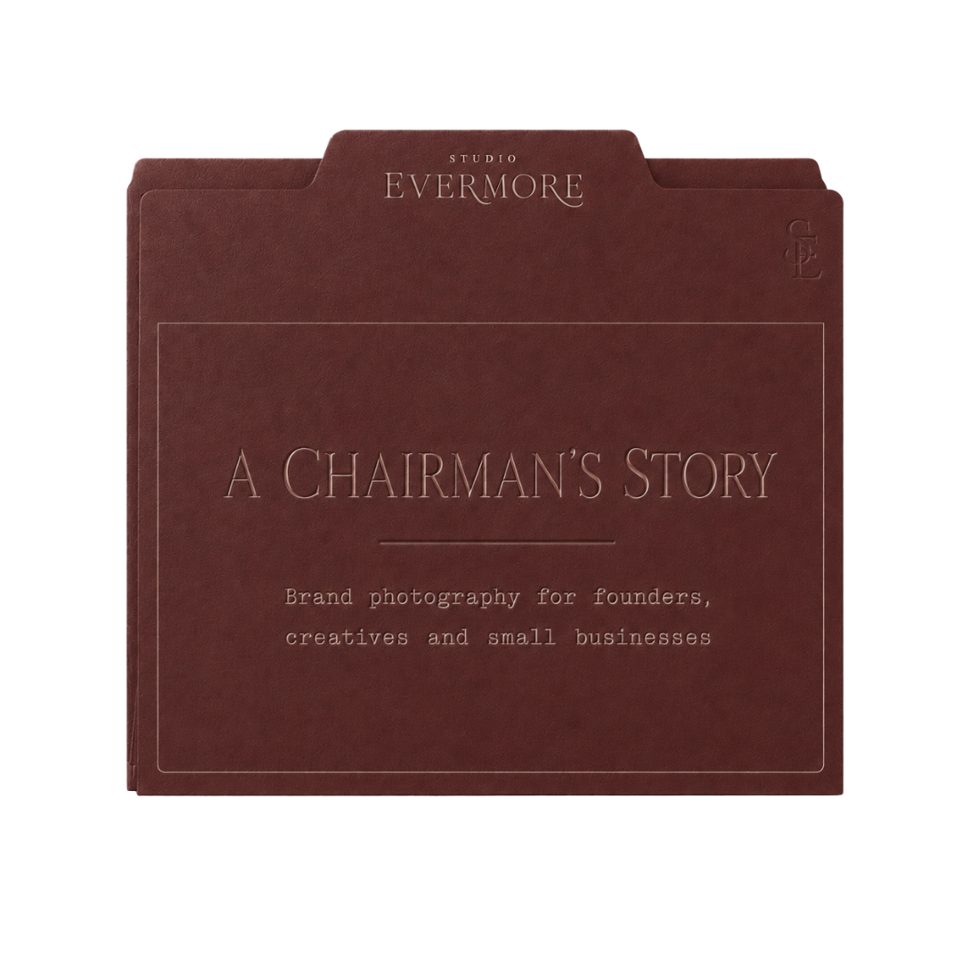 A maroon folder with the title 'A Chairman's Story' and subtitle 'Brand photography for founders, creatives and small businesses'.