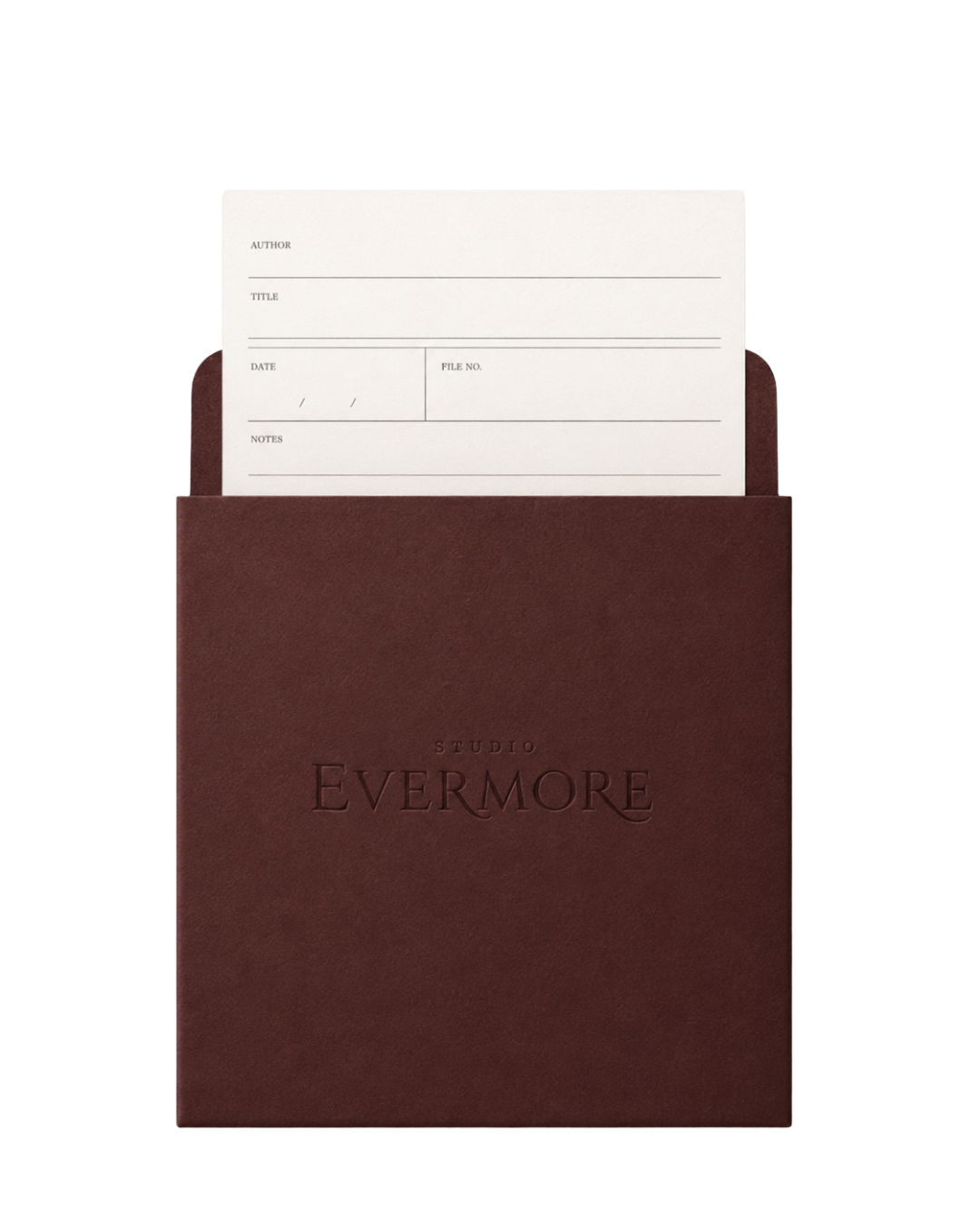 A brown folder with the embossed text 'STUDIO EVERMORE' on the front. Inside, there is a white file card with fields for author, title, date, file number, and notes.