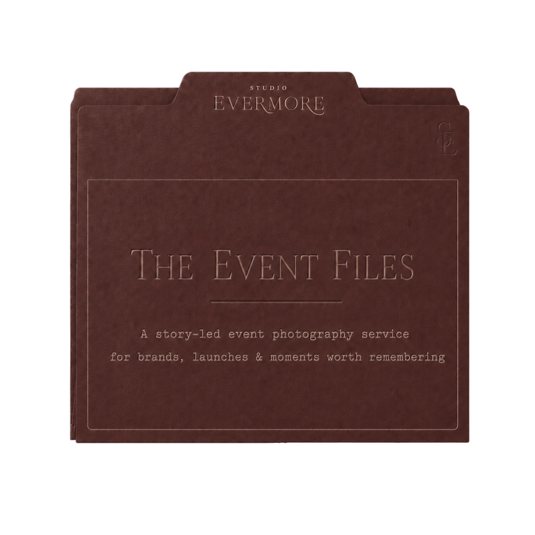 Close-up of a brown folder with embossed text reading "The Event Files" and smaller text describing a storytelling event photography service.