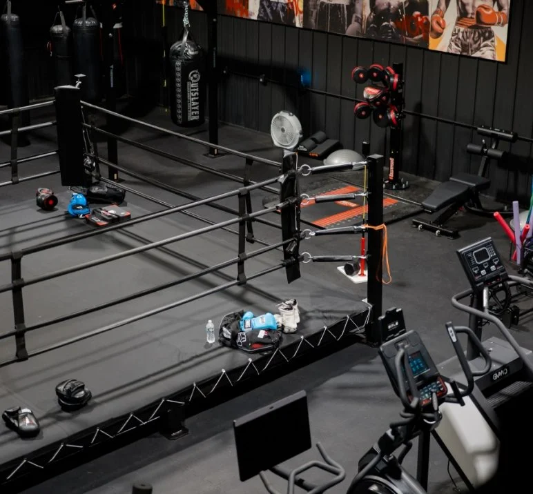 Full gym and boxing ring amenity at the Culture Cove retreat space.