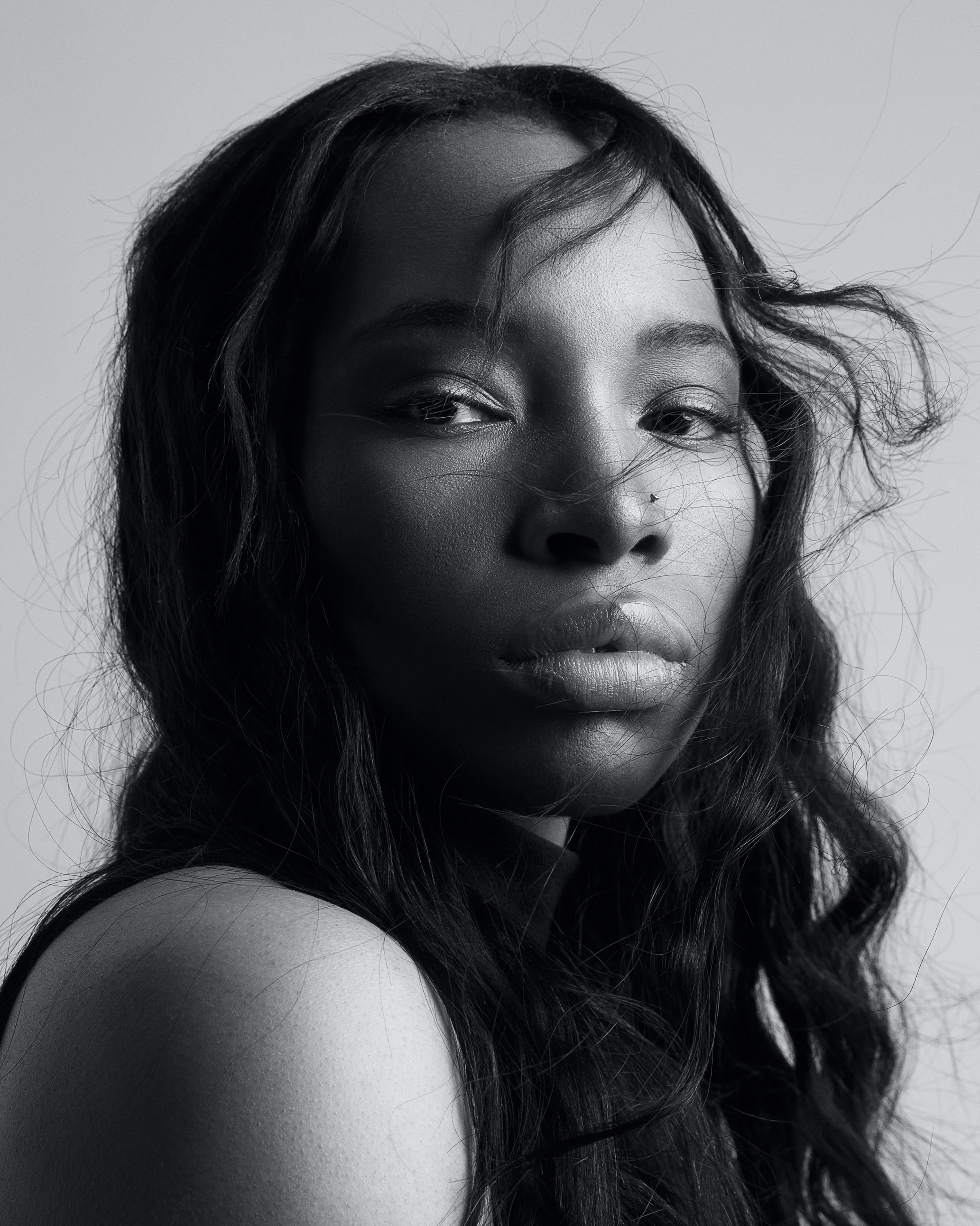 moody dramatic image of model photographed by donovan cole