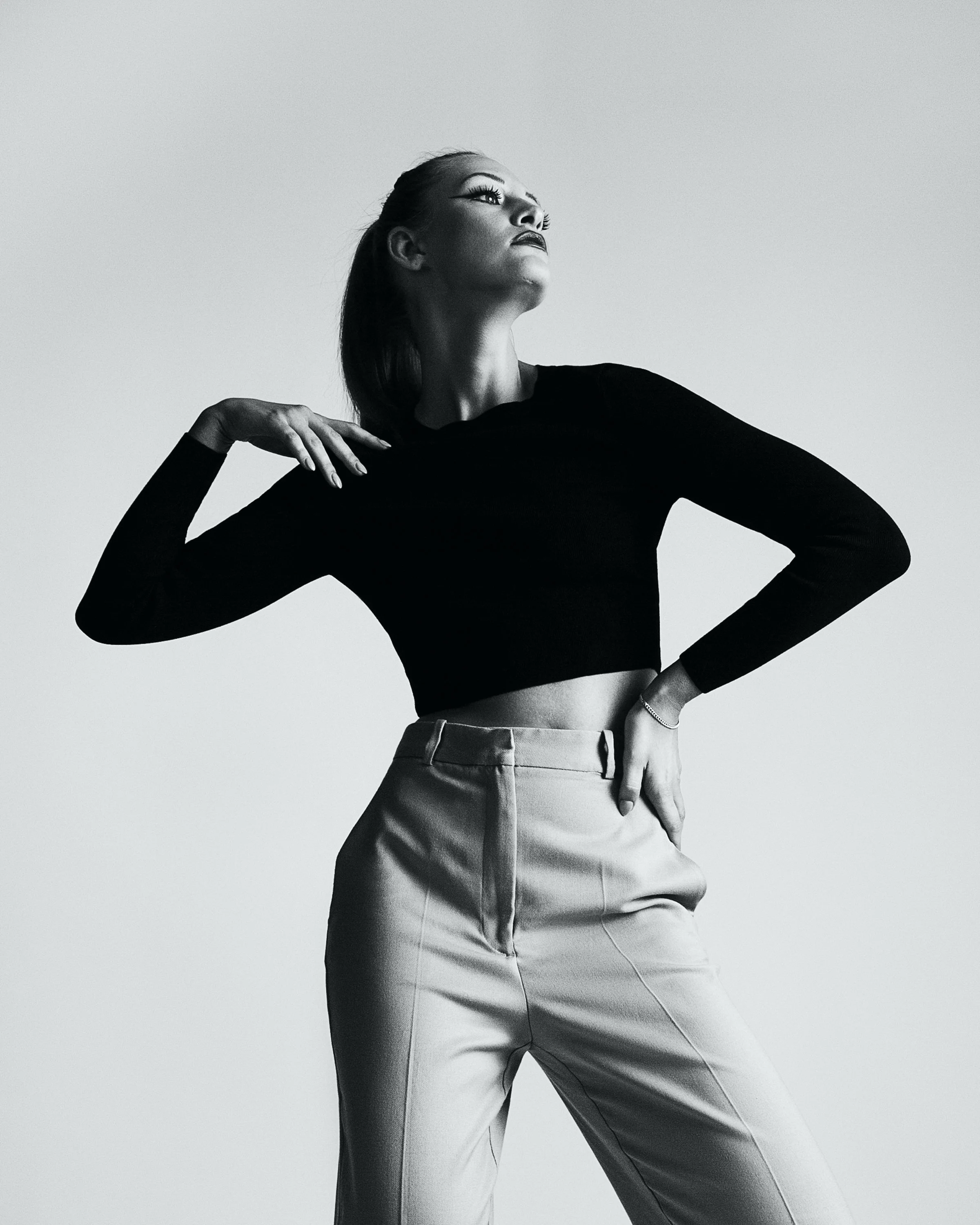 high-fashion portrait with dramatic lighting for clothing brand