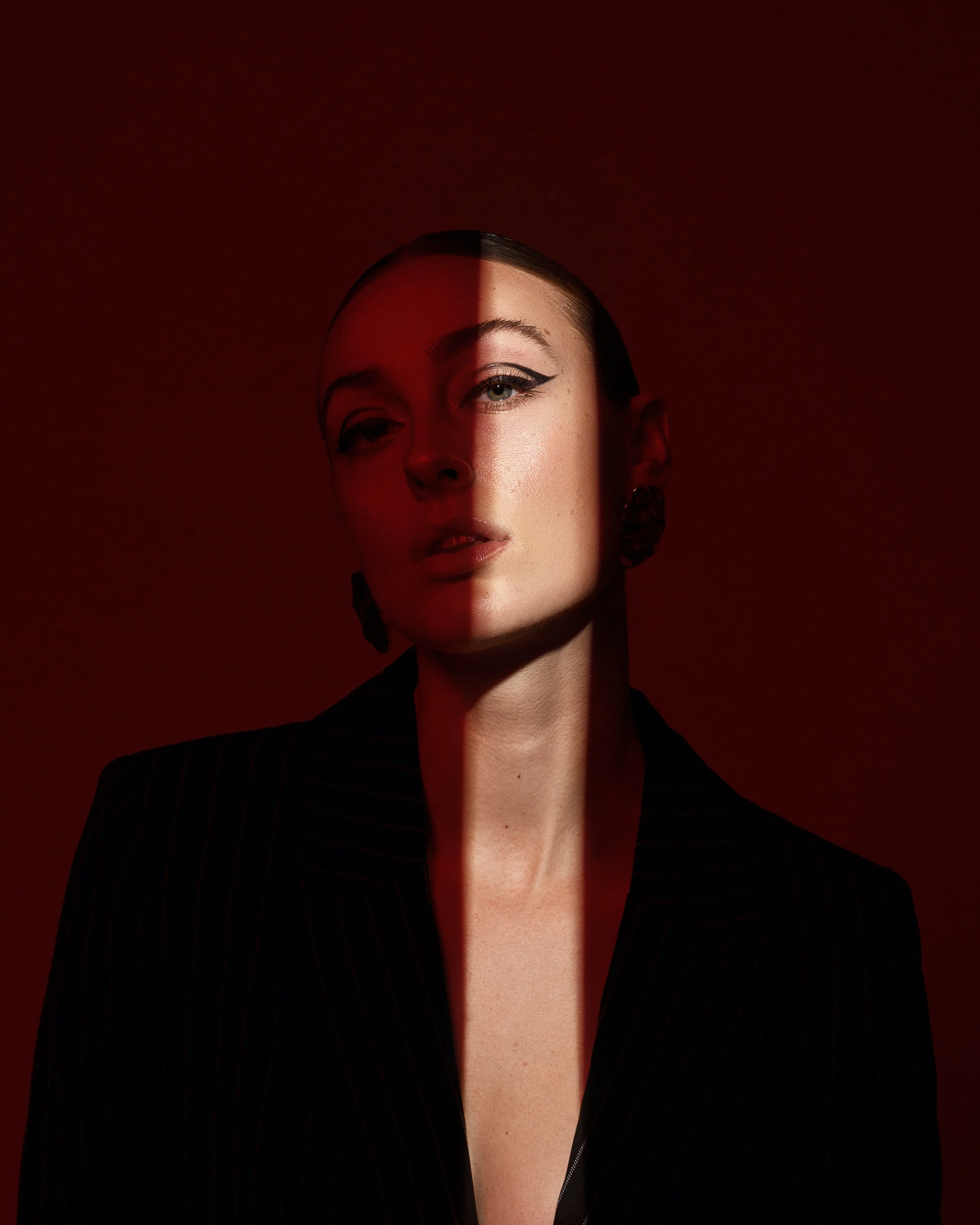 commercial fashion editorial featuring model in black blazer photographed by Donovan Cole Orange Kat Energy in Los Angeles