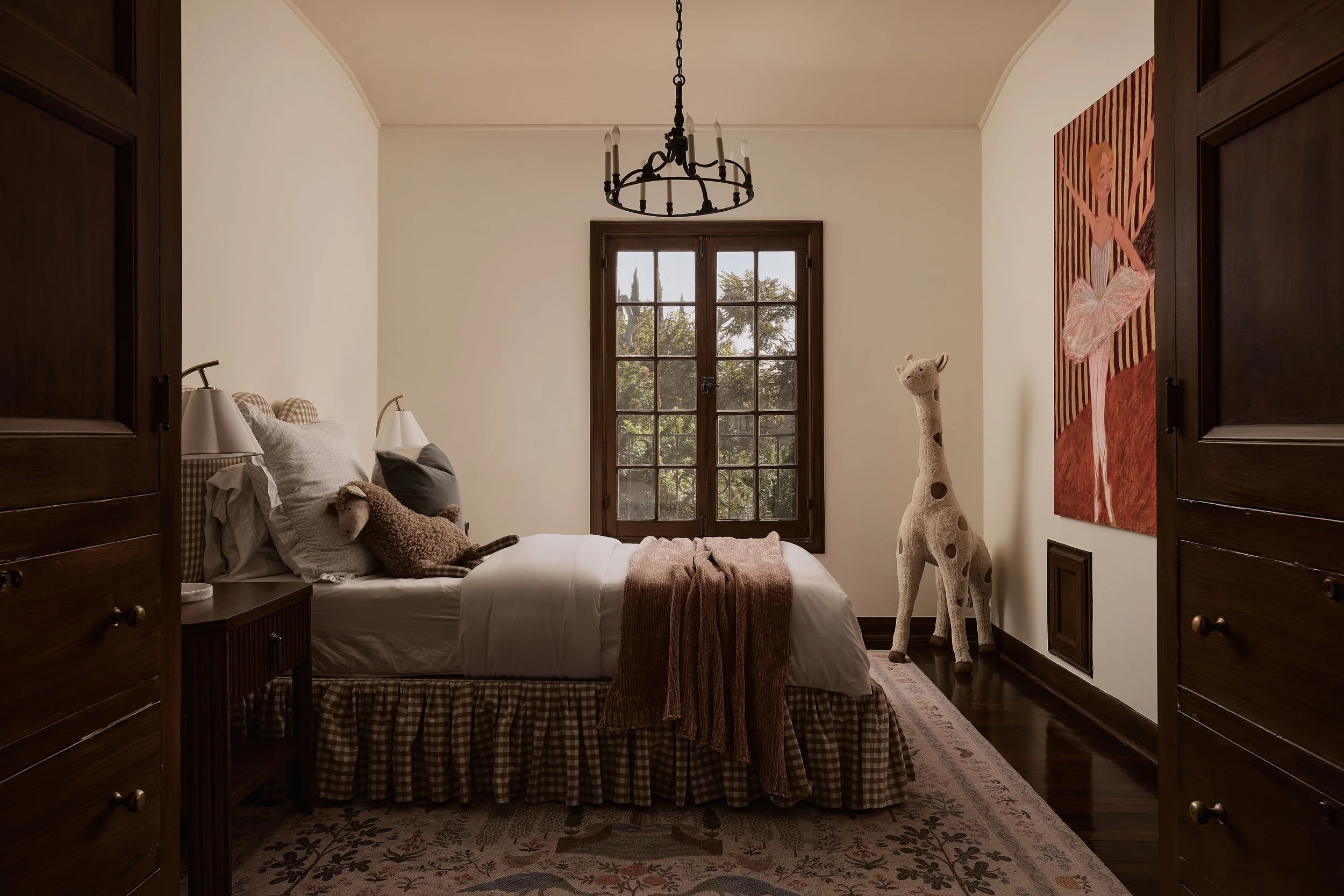 Guest bedroom in a luxury Hancock Park residence in Los Angeles featuring layered textiles, traditional architecture, and interior styling by Francesca Grace.