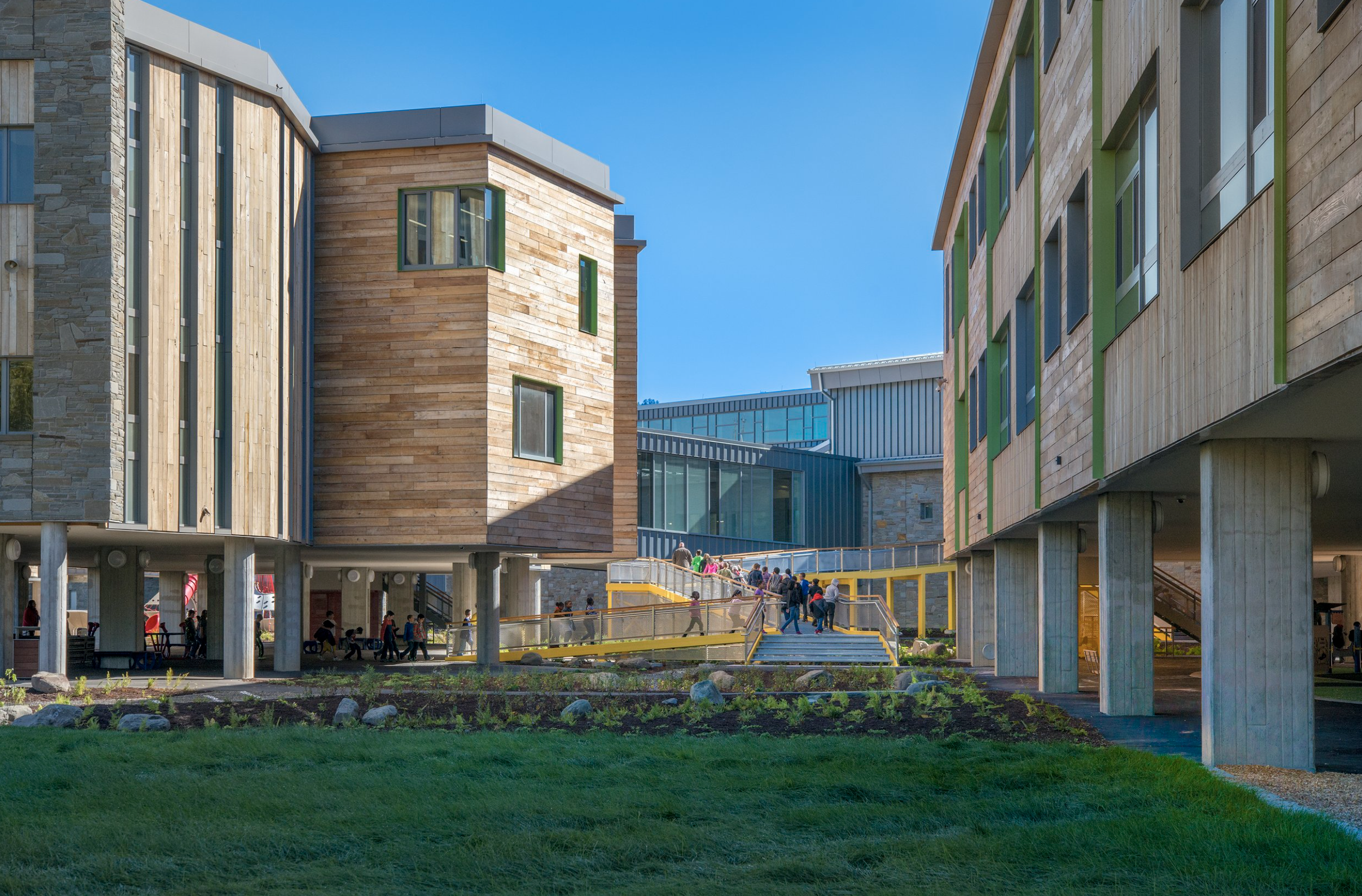 Campus pedestrian bridge linking academic buildings while supporting accessible circulation, outdoor learning, and community connection.