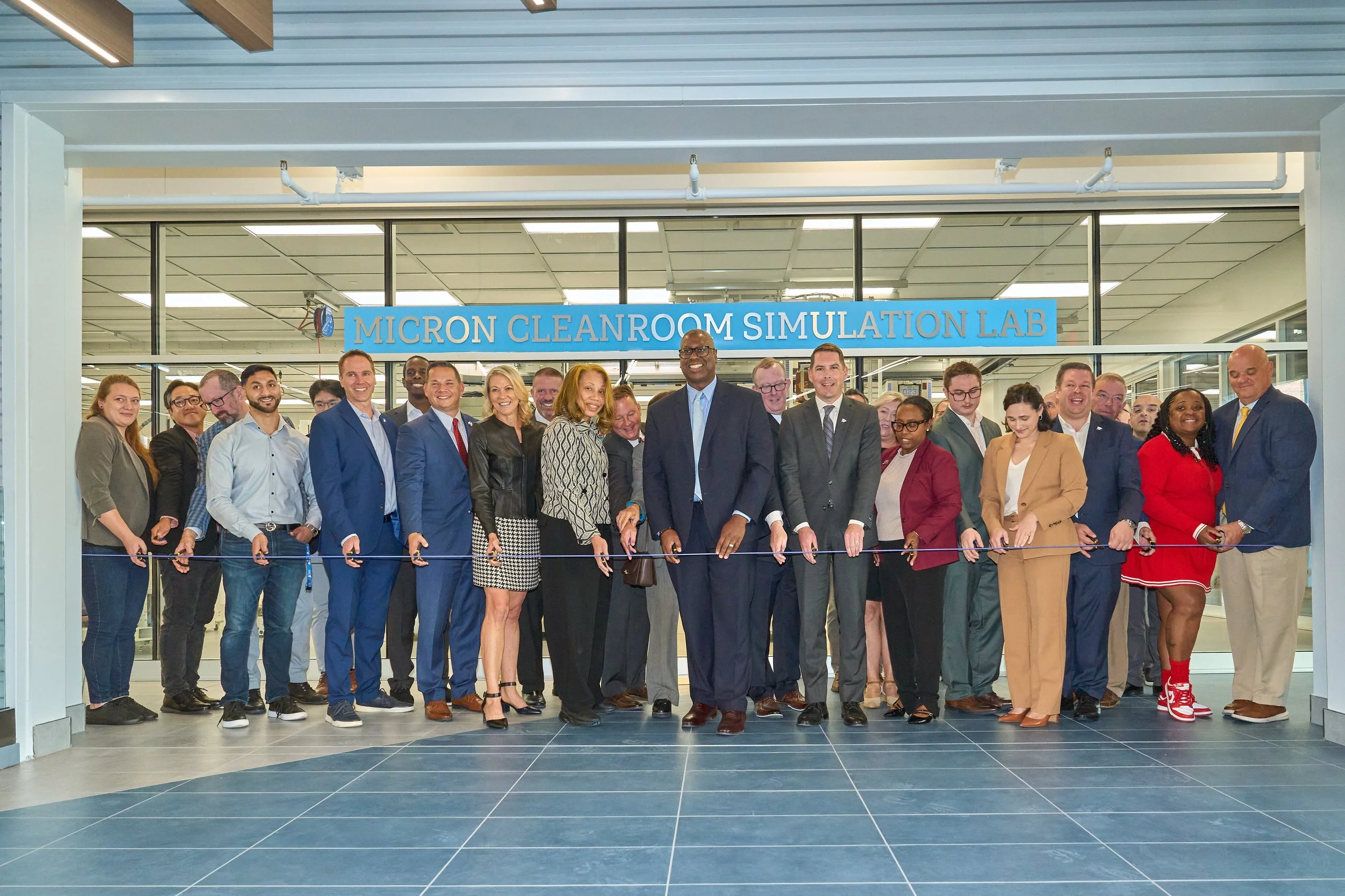 Ashley McGraw Joins OCC for "Wire Cutting" for Opening of Micron Cleanroom Simulation Lab