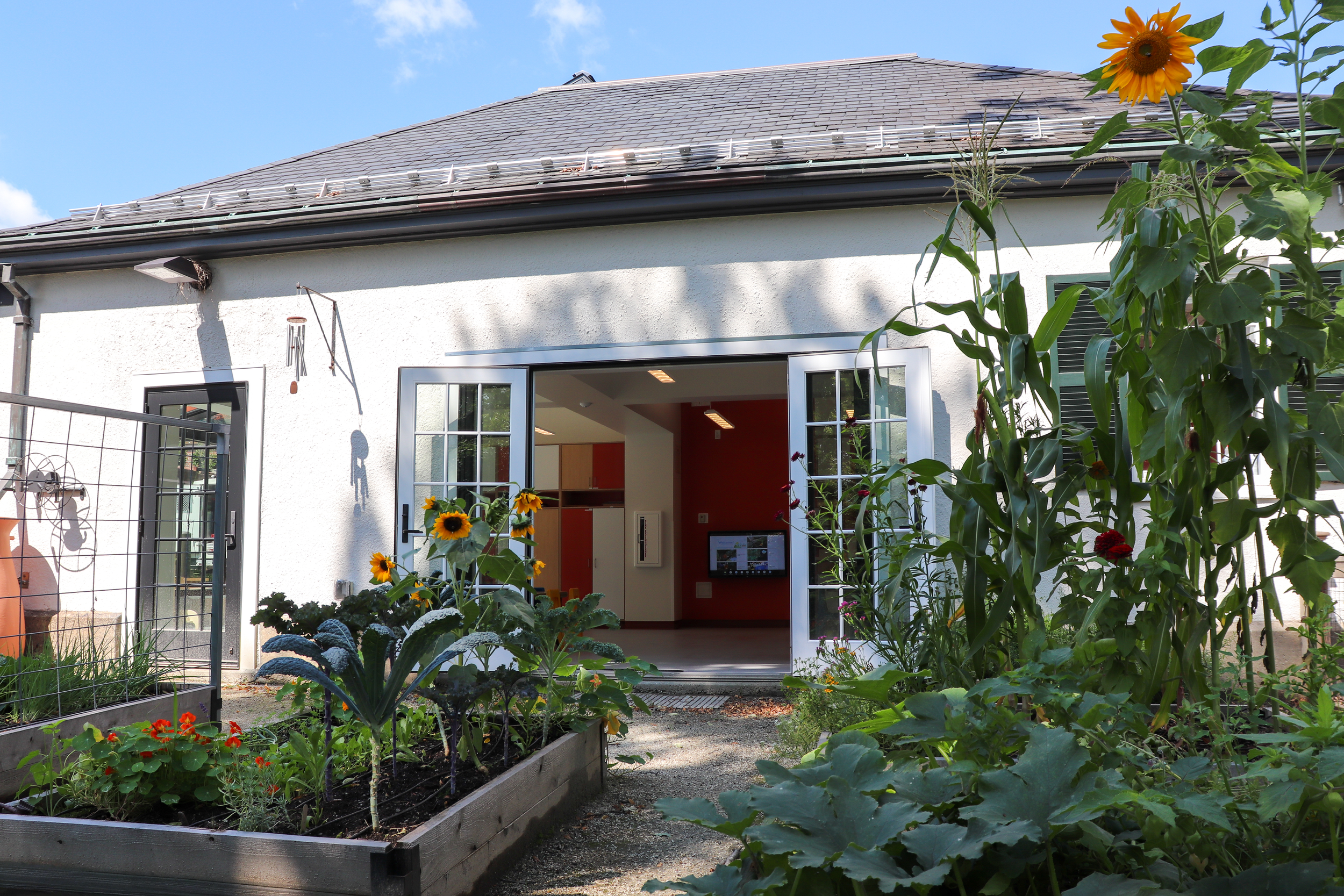Children’s garden with raised planting beds and direct access to the early education center.