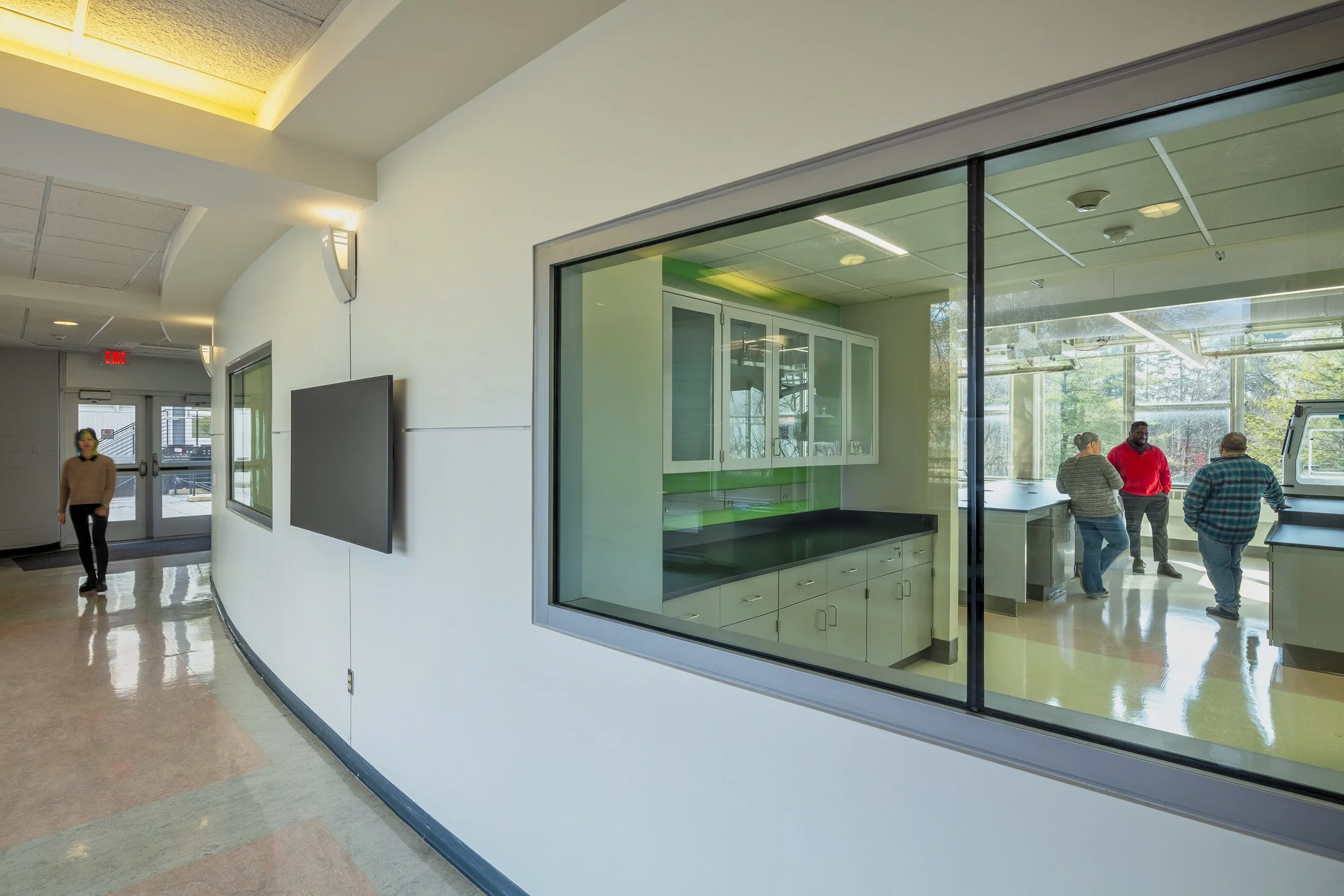 Interior corridor overlooking laboratory space at Cornell University.