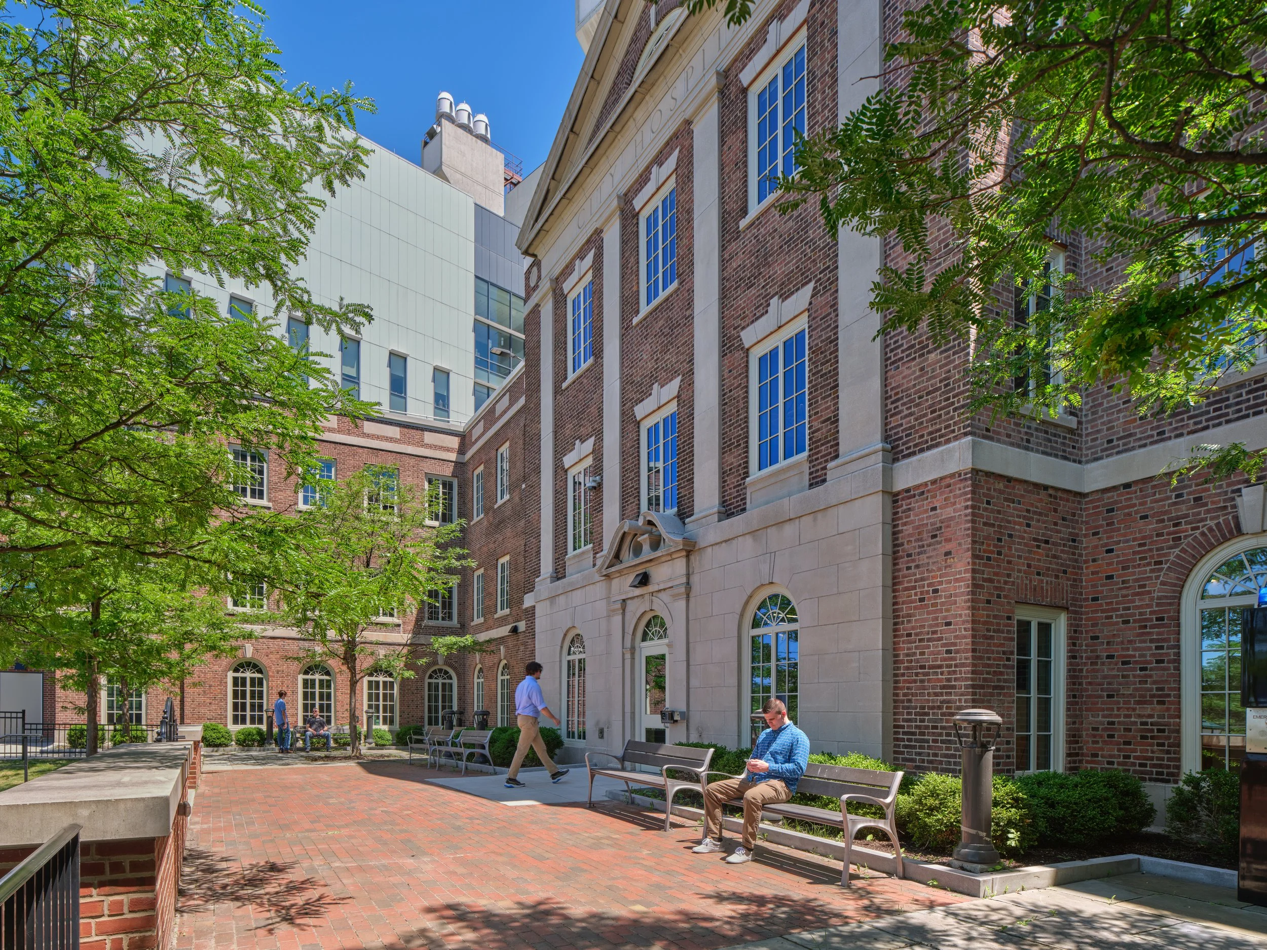 Exterior view of the renovated Silverman Hall at SUNY Upstate Medical University, showcasing the restored historic building envelope.