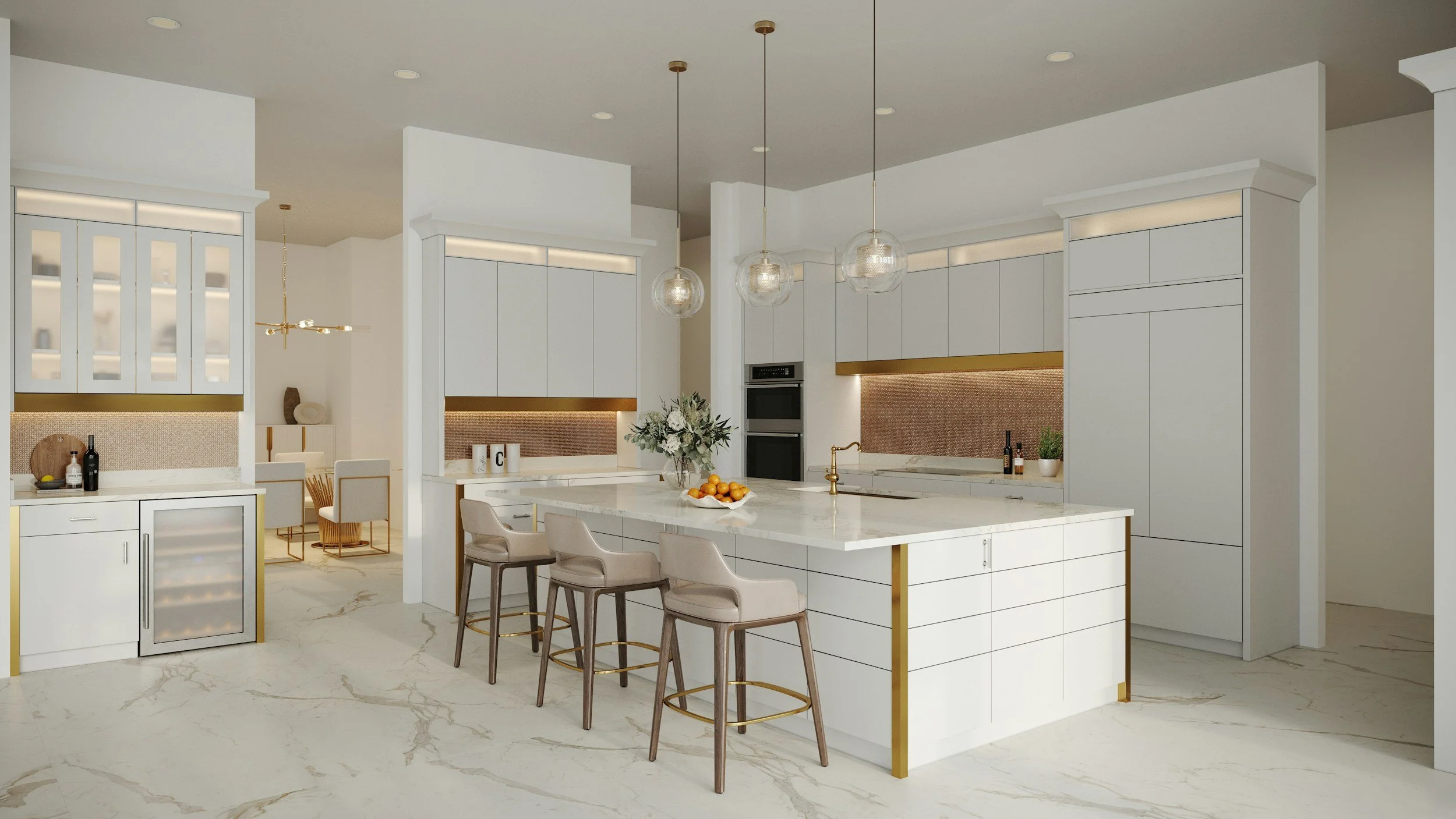 Modern white kitchen with marble countertops, dining area, and gold accents, decorated with an island, pendant lights, and a bowl of oranges.