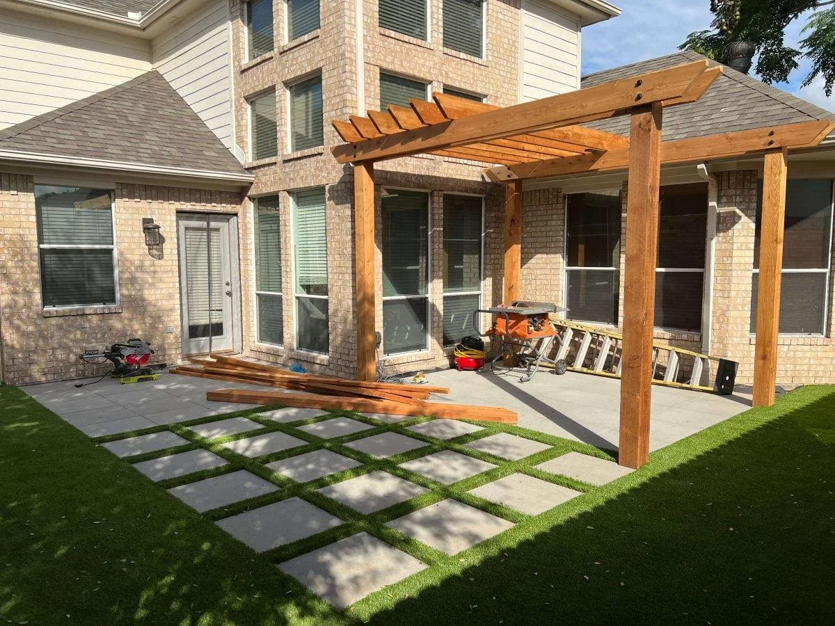 Outdoor living space construction in Dallas–Fort Worth by Gold Oak Remodeling featuring pergola installation and patio design.