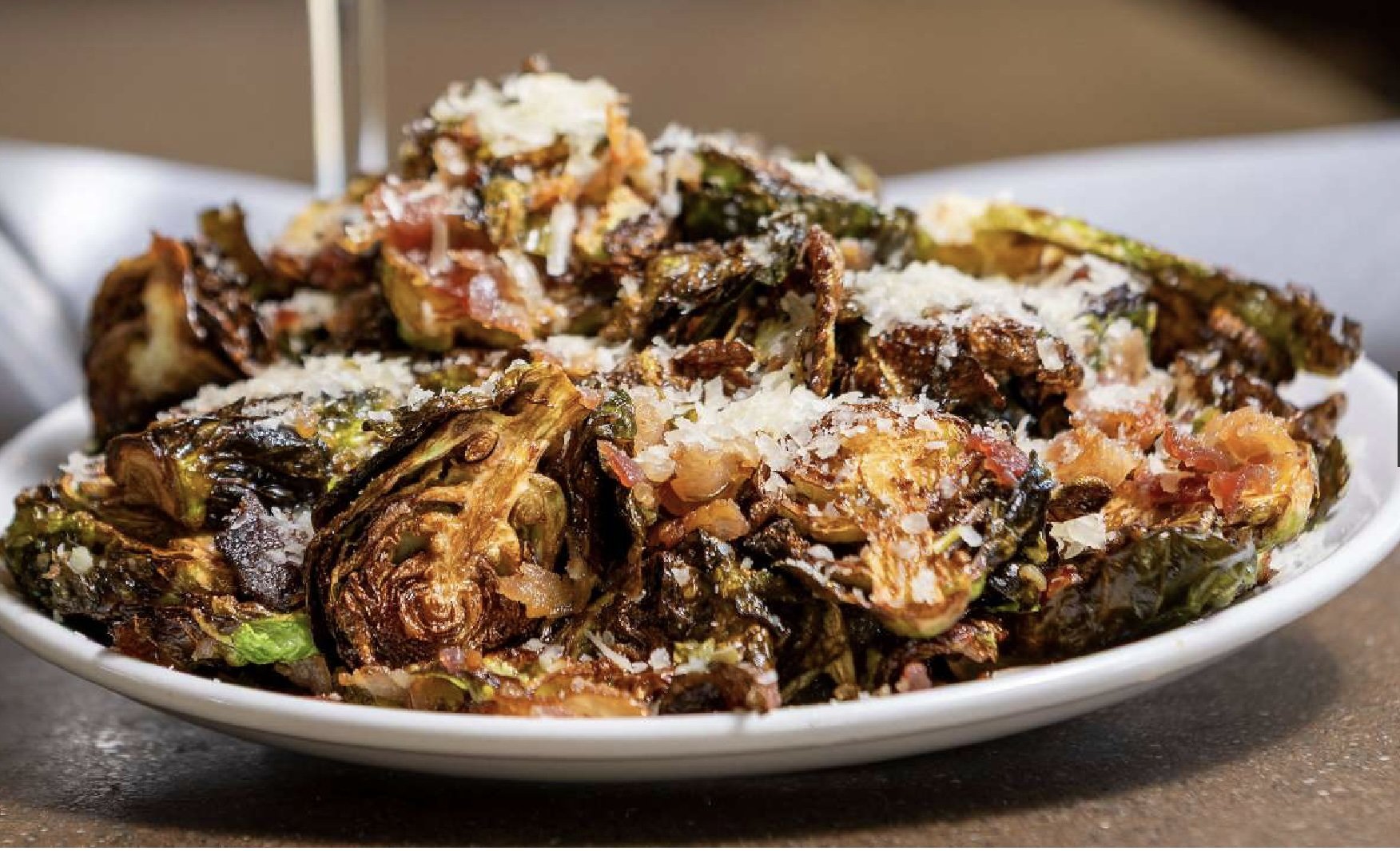 Fried Brussel sprouts with bacon and cheese