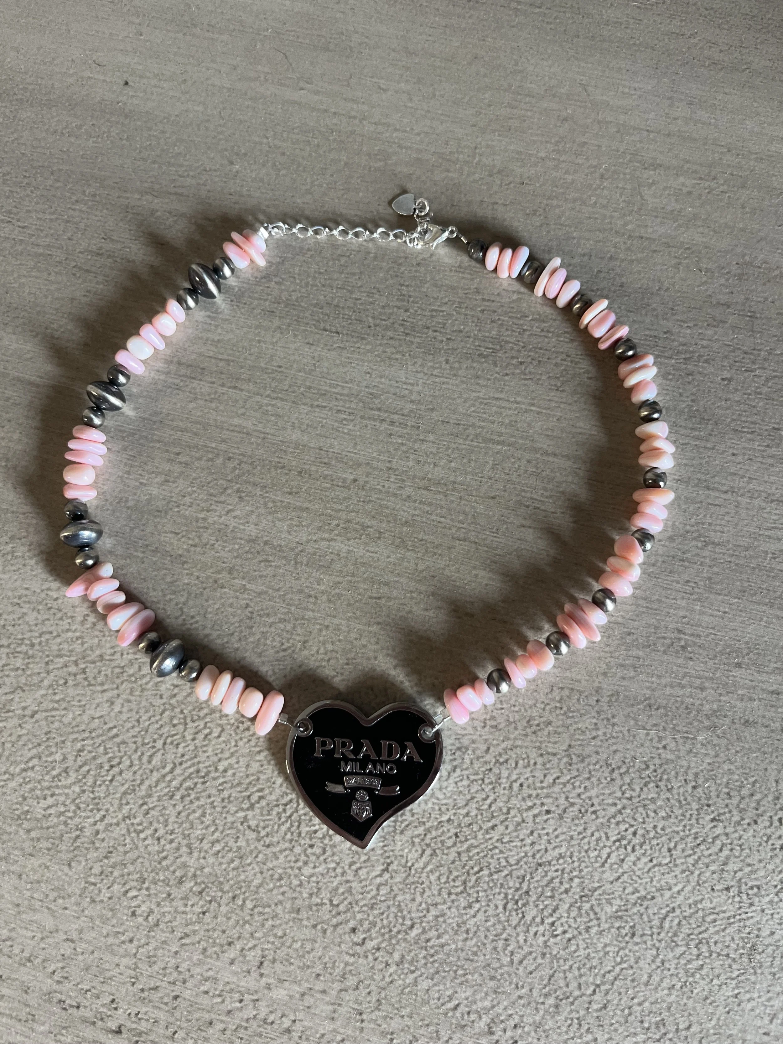 Chunky pink conch Prada