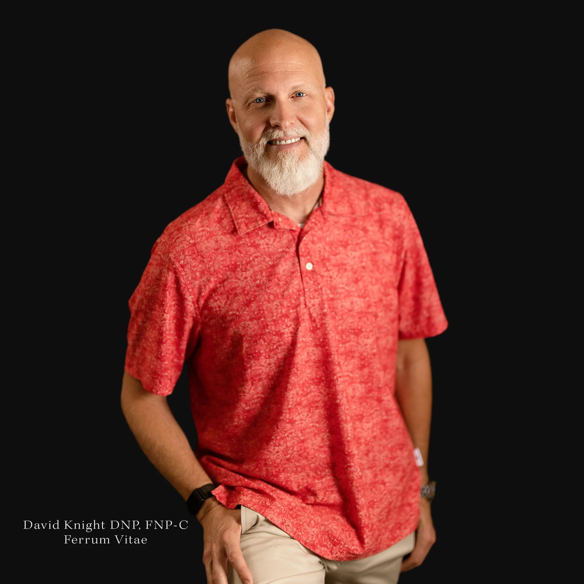 David Knight, DNP, FNP-C, founder of Iron Life Health, wearing a red shirt against a black background.