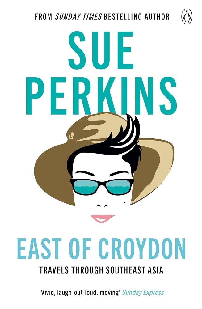 Book cover for 'East of Croydon' by Sue Perkins. Features a stylized illustration of Sue Perkins wearing sunglasses and a large hat. The cover indicates she travels through Southeast Asia and includes a quote from the Sunday Express.