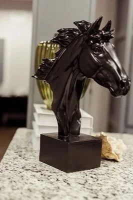 Horse sculpture displayed as decor at Southwest Aesthetics+ in Lawton, OK