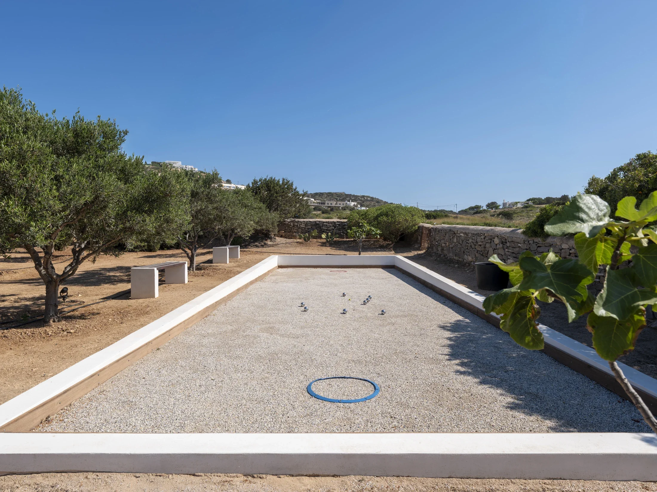 A private petanque court at Villa Kavouraki's garden in Paros.