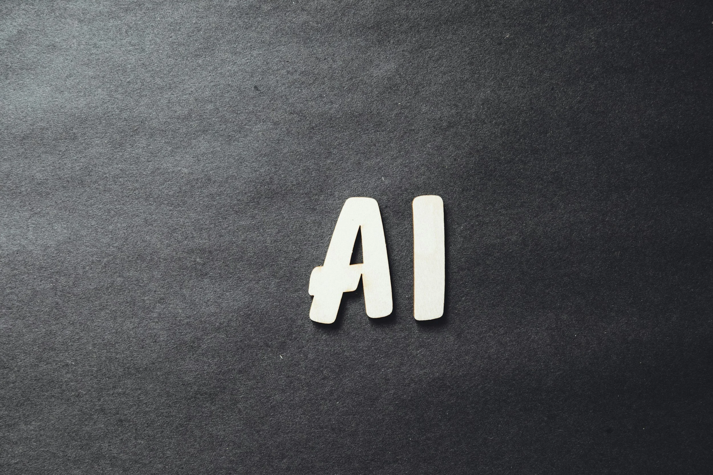 AI text representing Maverick HQ's AI tools and automation services for businesses.
