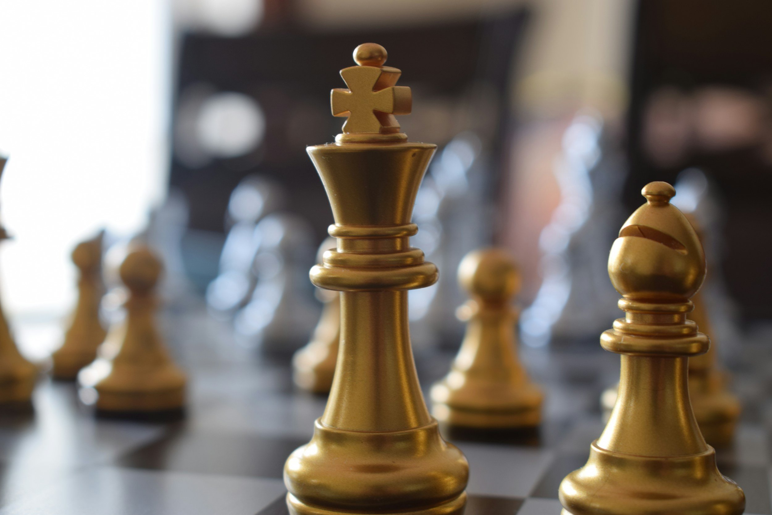 Strategic marketing planning represented by a gold chess king piece — Maverick HQ marketing consultancy.