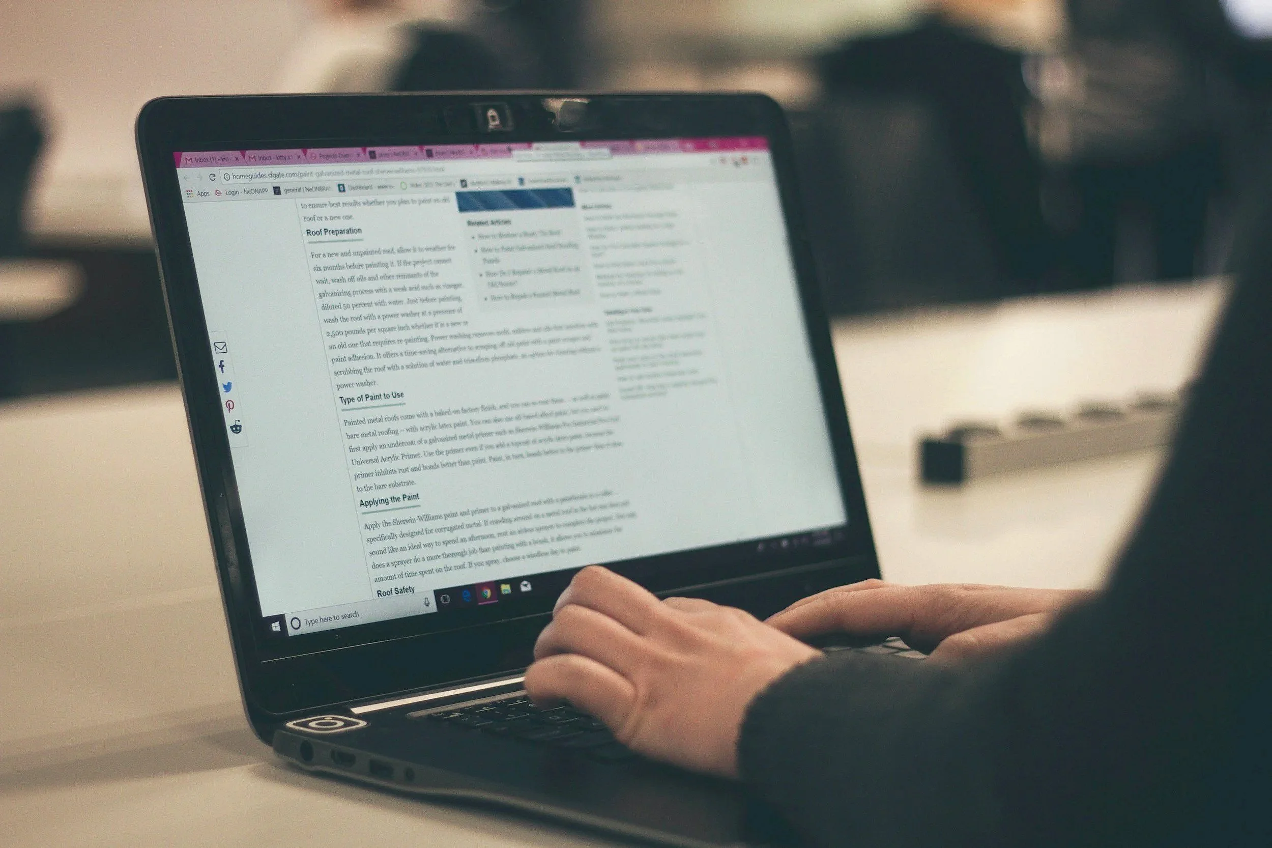Marketing professional using a laptop representing Maverick HQ's content writing and digital marketing services.