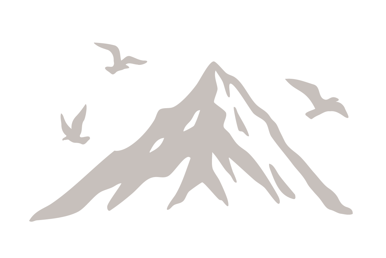 Silhouette of a mountain with three birds flying around it.
