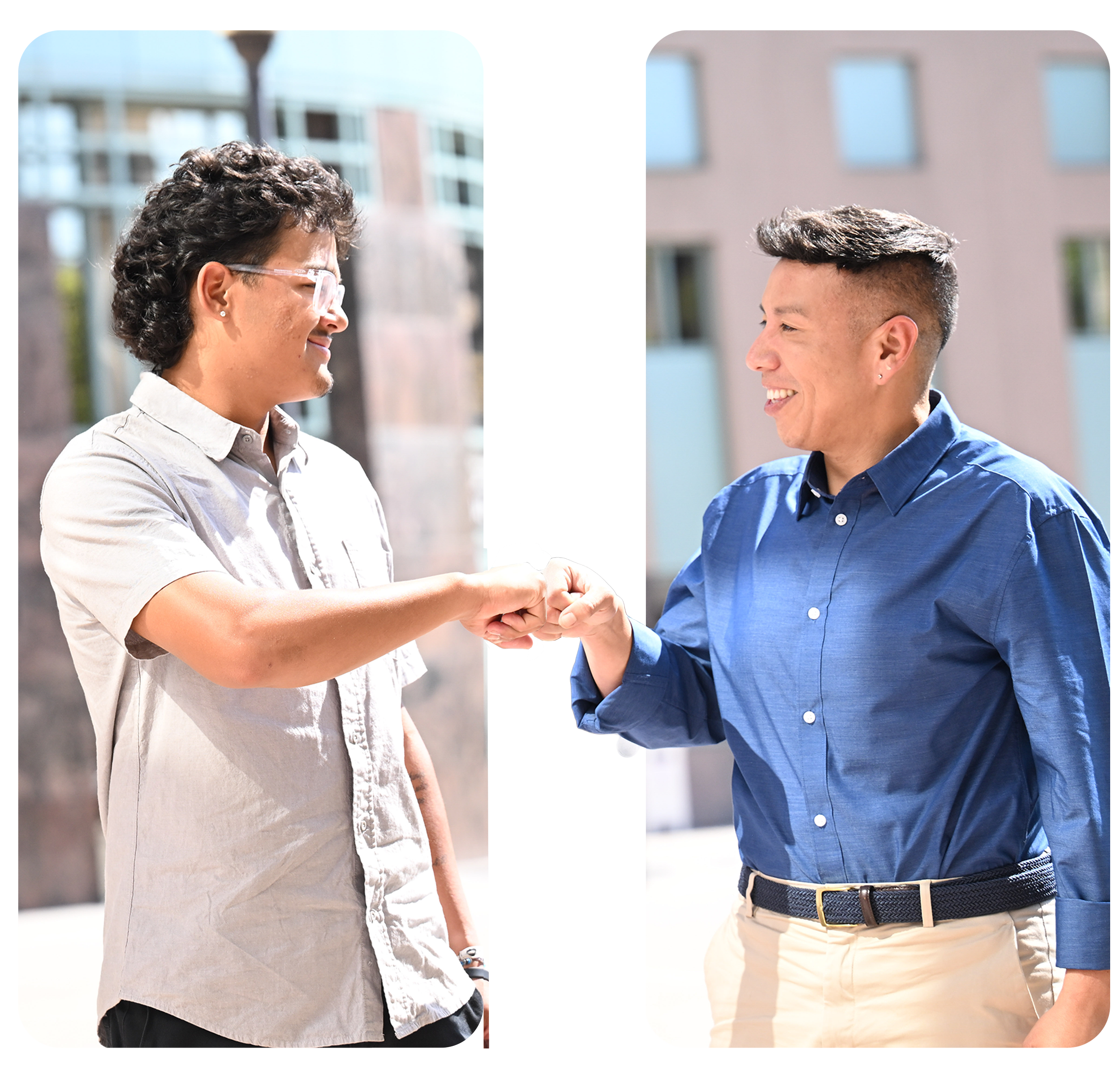 Two women with short hair exchanging a handshake outdoors with modern buildings in the background.