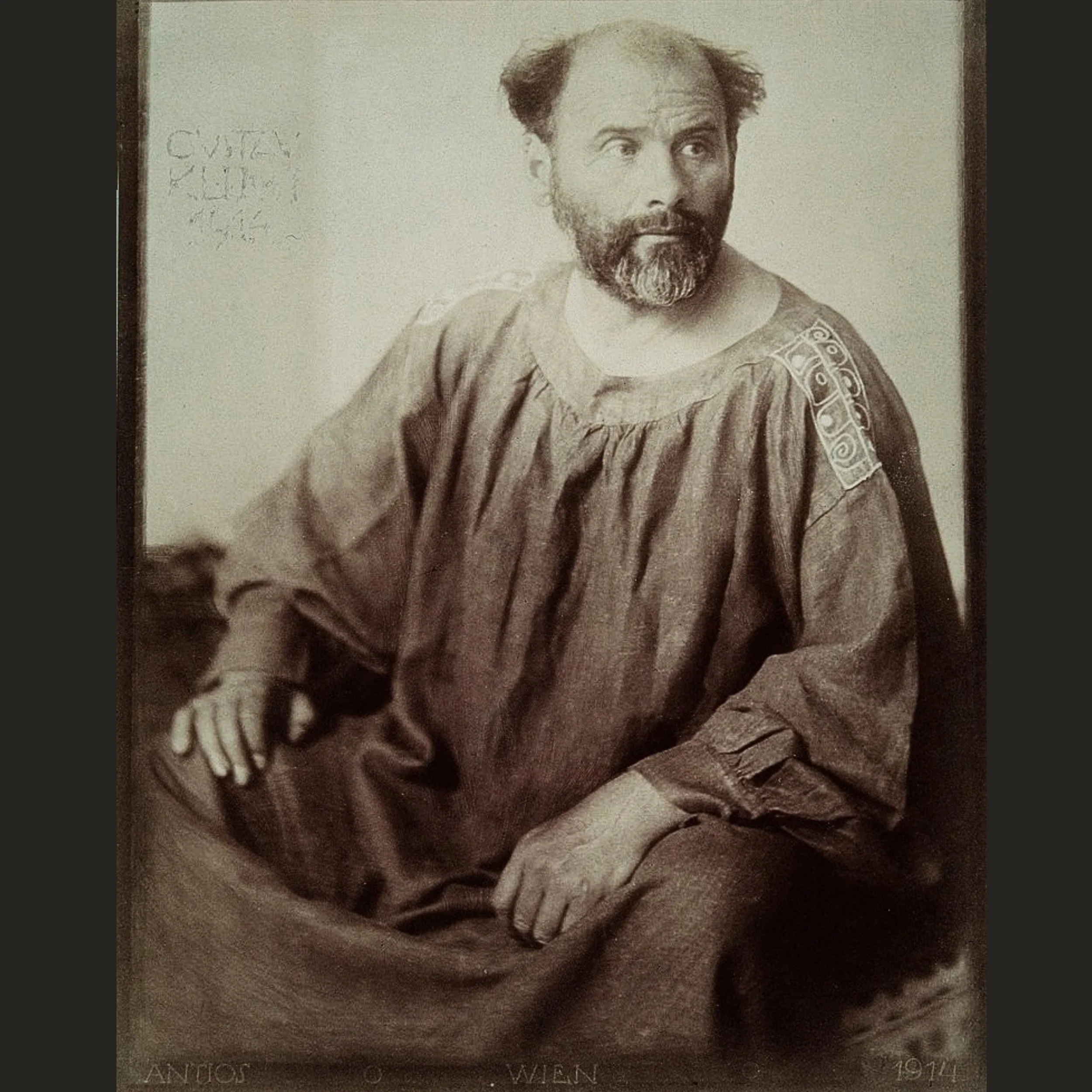 Klimt, dressed for work. His painter&rsquo;s smock looks like a monk&rsquo;s habit, with his own symbols stitched at the shoulder. He was the first president of the Secession, whose motto is still over its door: &ldquo;To every age its art, to art it