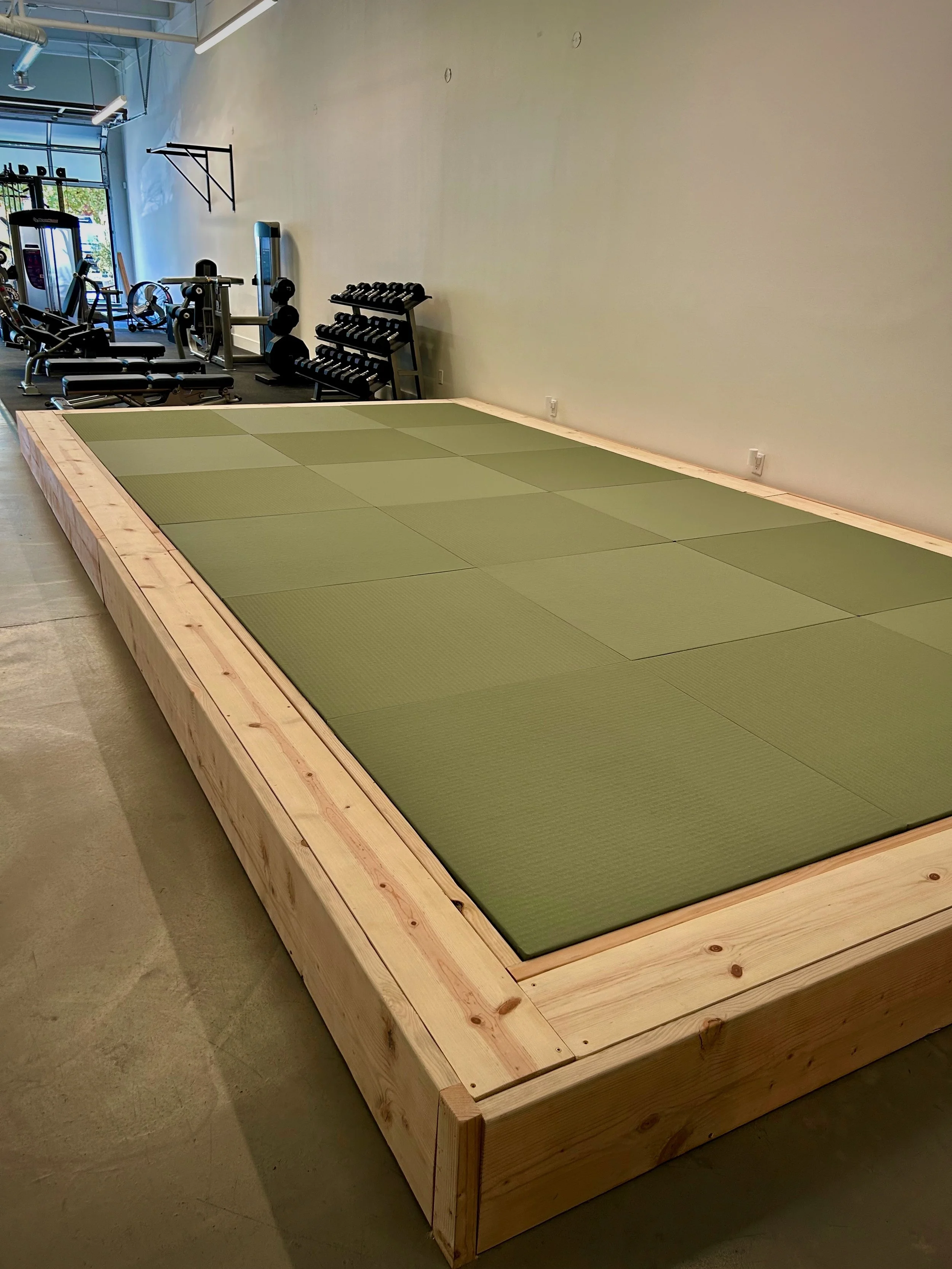 Custom tatami stretching platform and movement area at M.P.G. Studio Santa Monica.