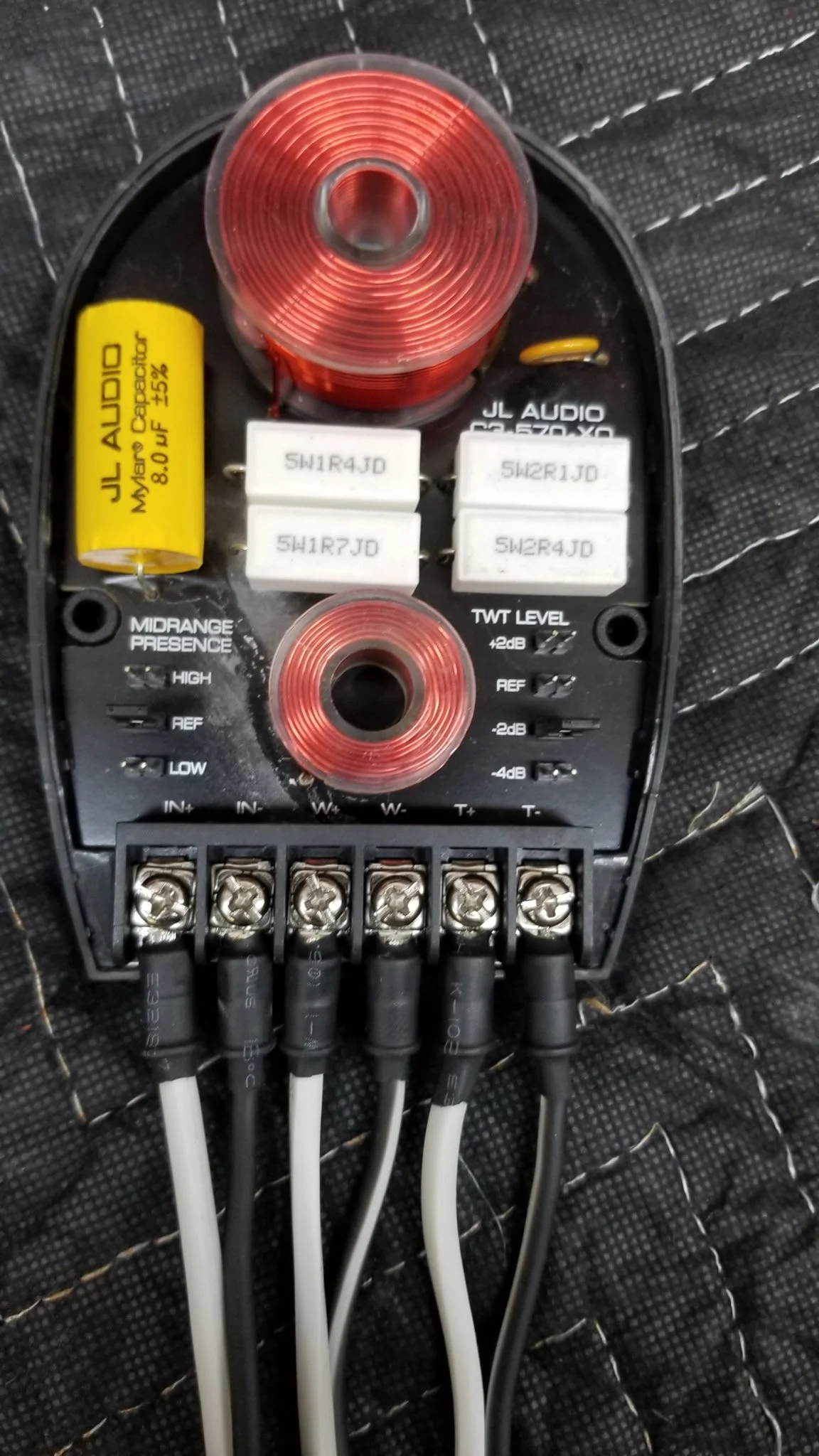 Marine power distribution block with fused connections for reliable high-performance audio system operation.