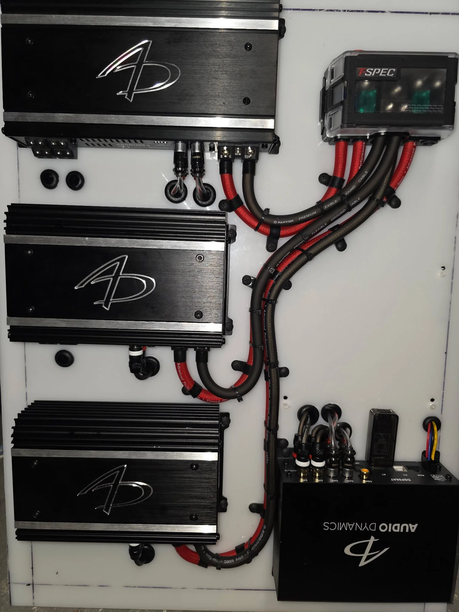 Custom marine amplifier rack with professional power distribution, signal management, and competition-inspired system design.