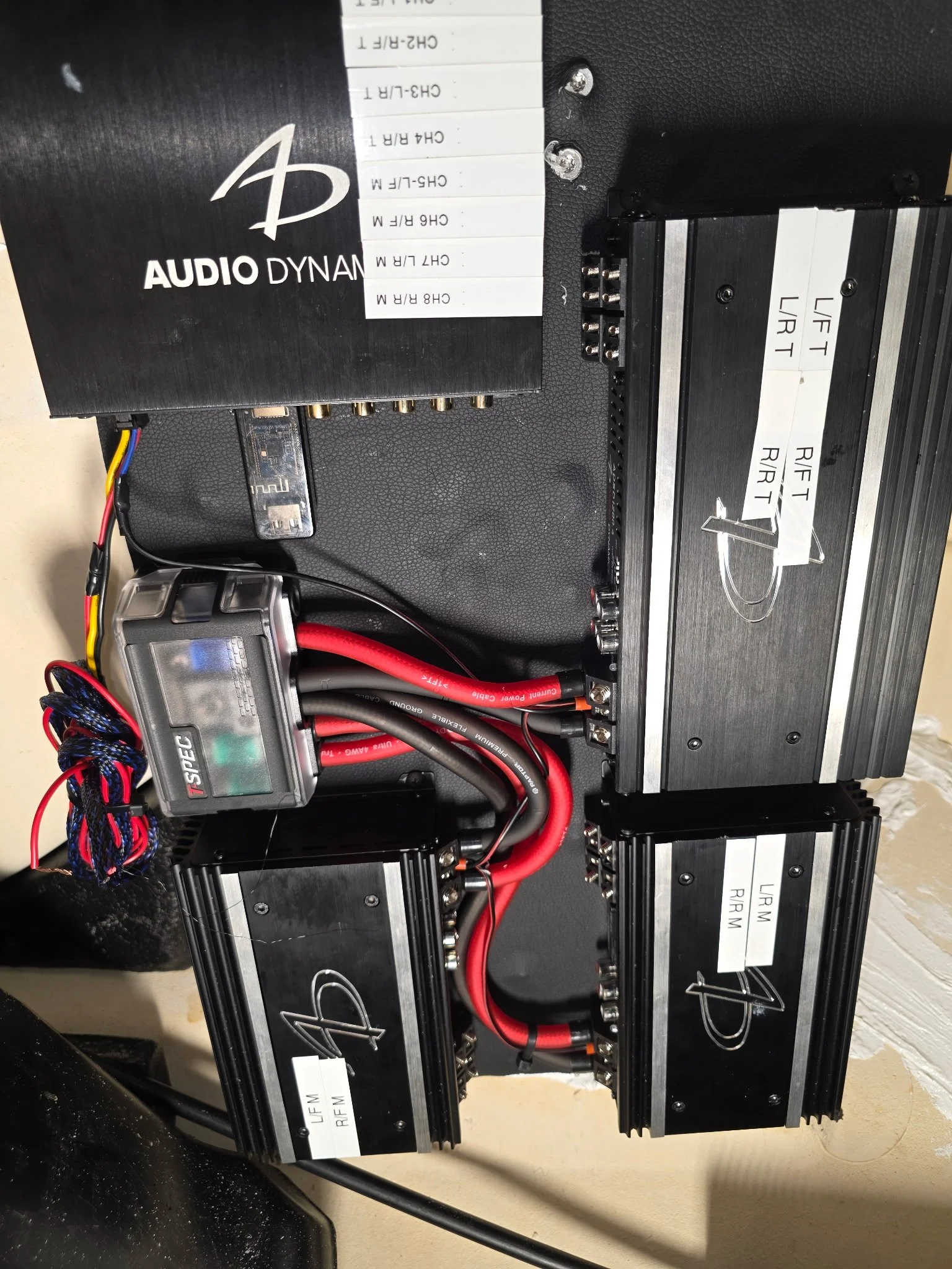 Marine amplifier installation with professional wiring, fused power distribution, and competition-inspired system design.