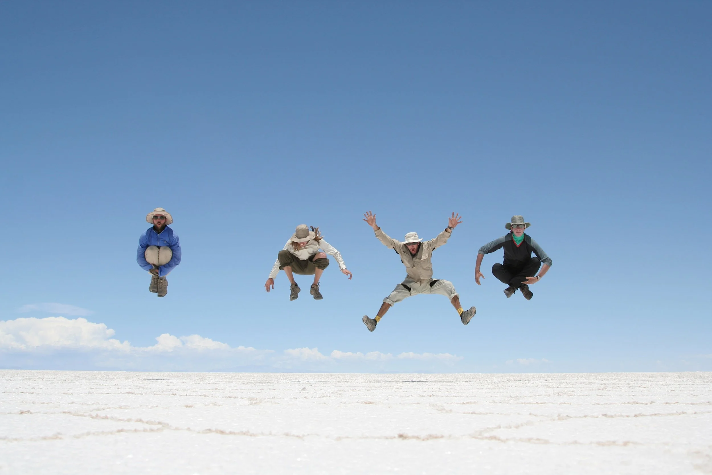 Men jumping above salt flats in Bolivia