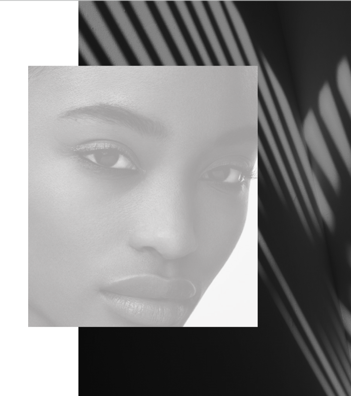 Close-up of a woman's face in black and white, with a focus on her eye, lips, and smooth skin, layered over a background of diagonal black and white lines.