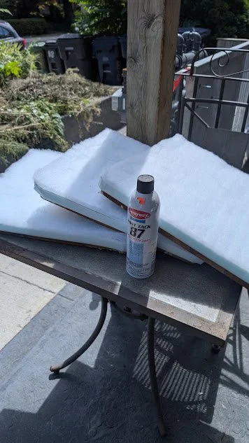 gluing new 1" foam and Dacron to the wooden seats