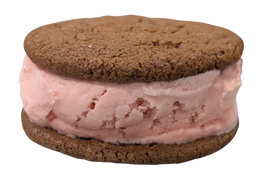 Chocolate cookies with pink strawberry ice cream in the middle.