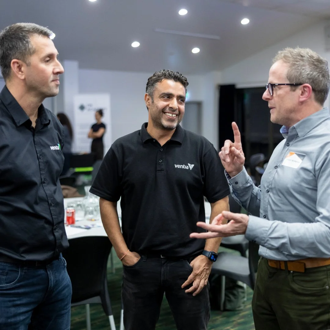 Delegates networking and discussing industry topics. Preparing for Clearway.