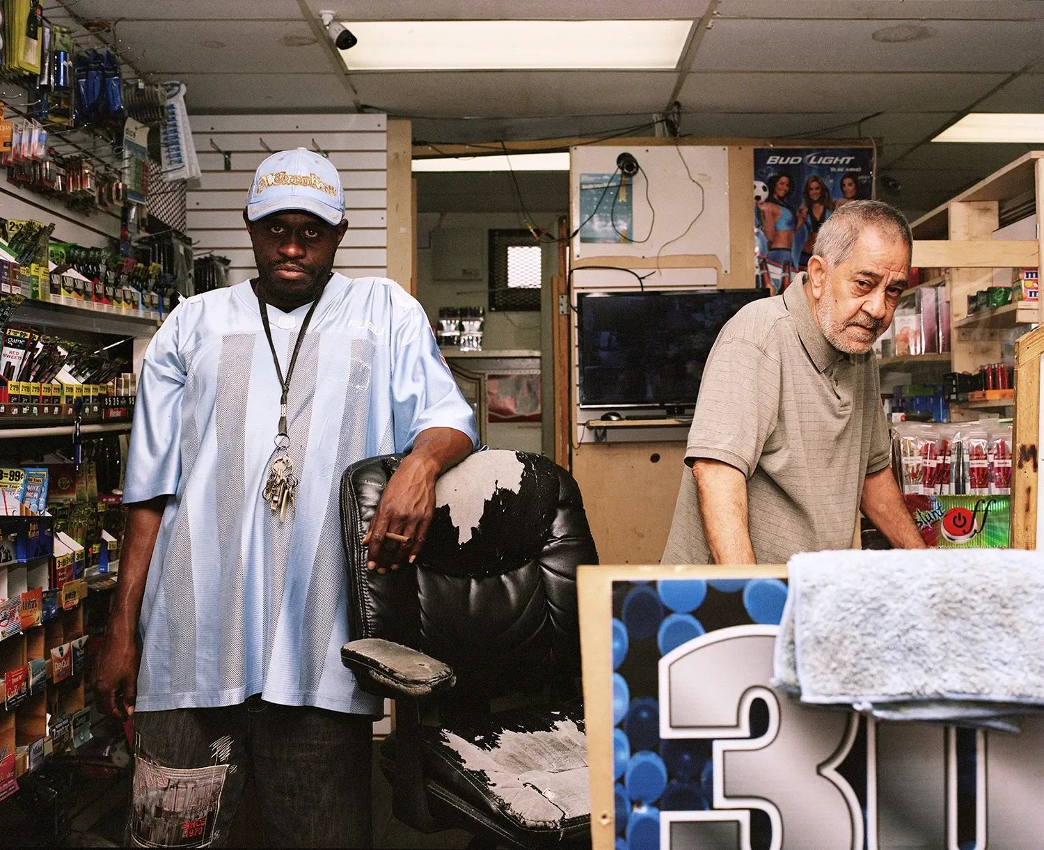 Two men that work at a convenience store in downtown Belle Glade.